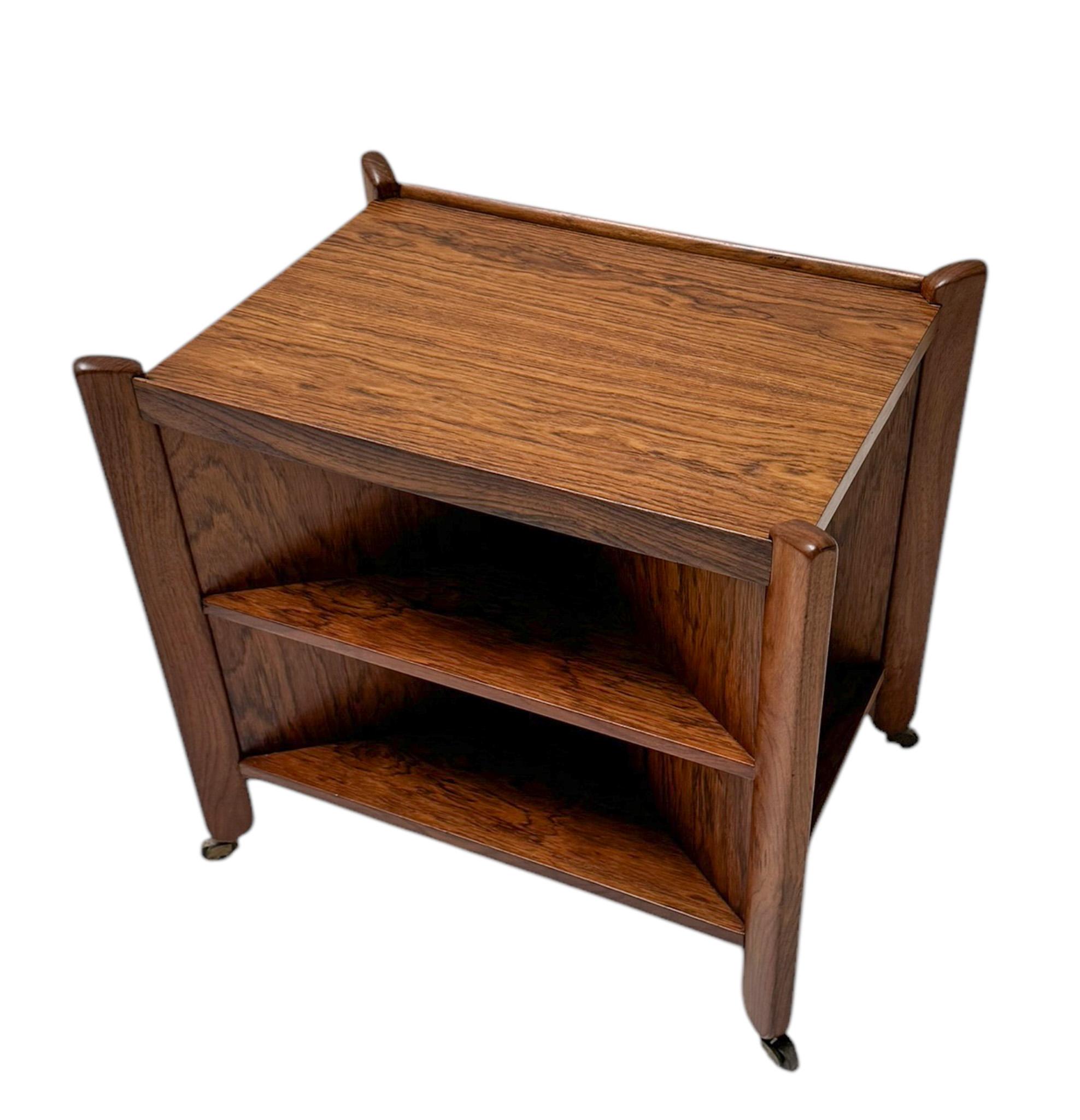 Magnificent and rare Art Deco Amsterdamse School cart or trolley.
Design by Paul Bromberg for H. Pander & Zonen Den  Haag.
Striking Dutch design from the 1920s.
Solid padouk frame with original padouk veneered tops.
Marked with manufacturers metal