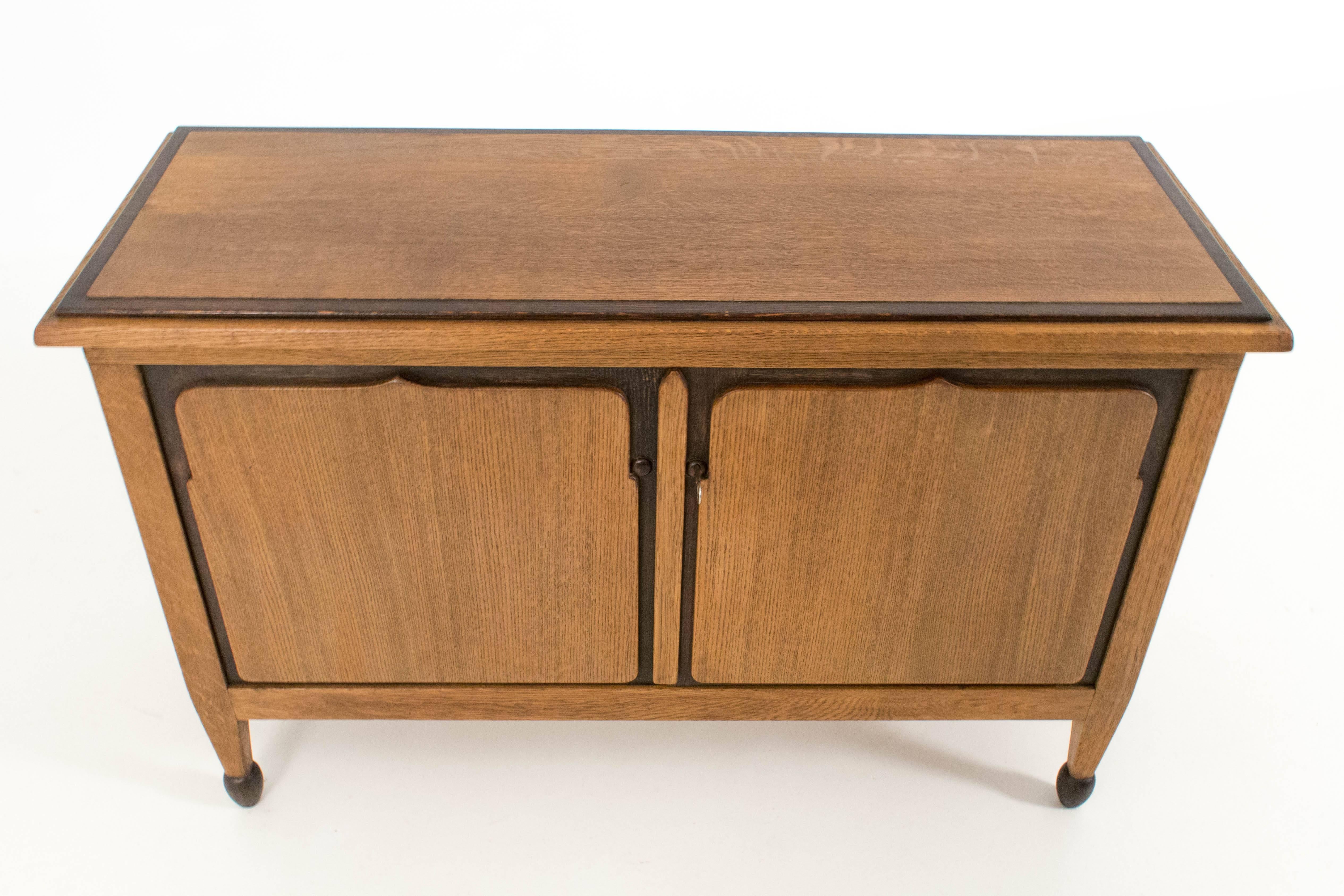 Stunning Art Deco Amsterdam school sideboard by Willem Penaat.
Solid oak with original ebonized details.
In good original condition with minor wear consistent with age and use,
preserving a beautiful patina.