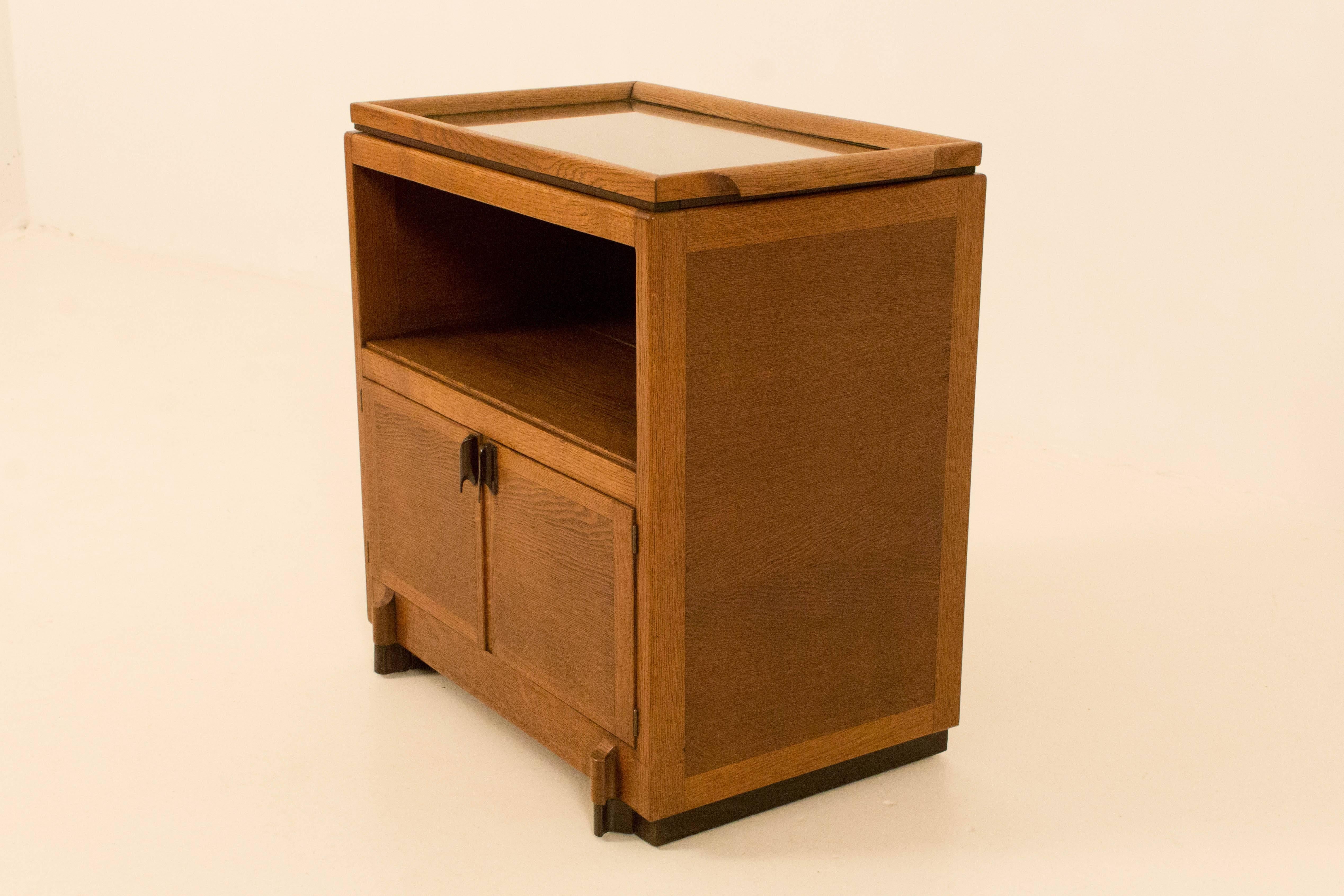 Rare Art Deco Amsterdam School tea cabinet with serving tray.
With solid ebony Macassar handles.
Striking design with ebony Macassar details.
In good original condition with minor wear consistent with age and use,
preserving a beautiful patina.