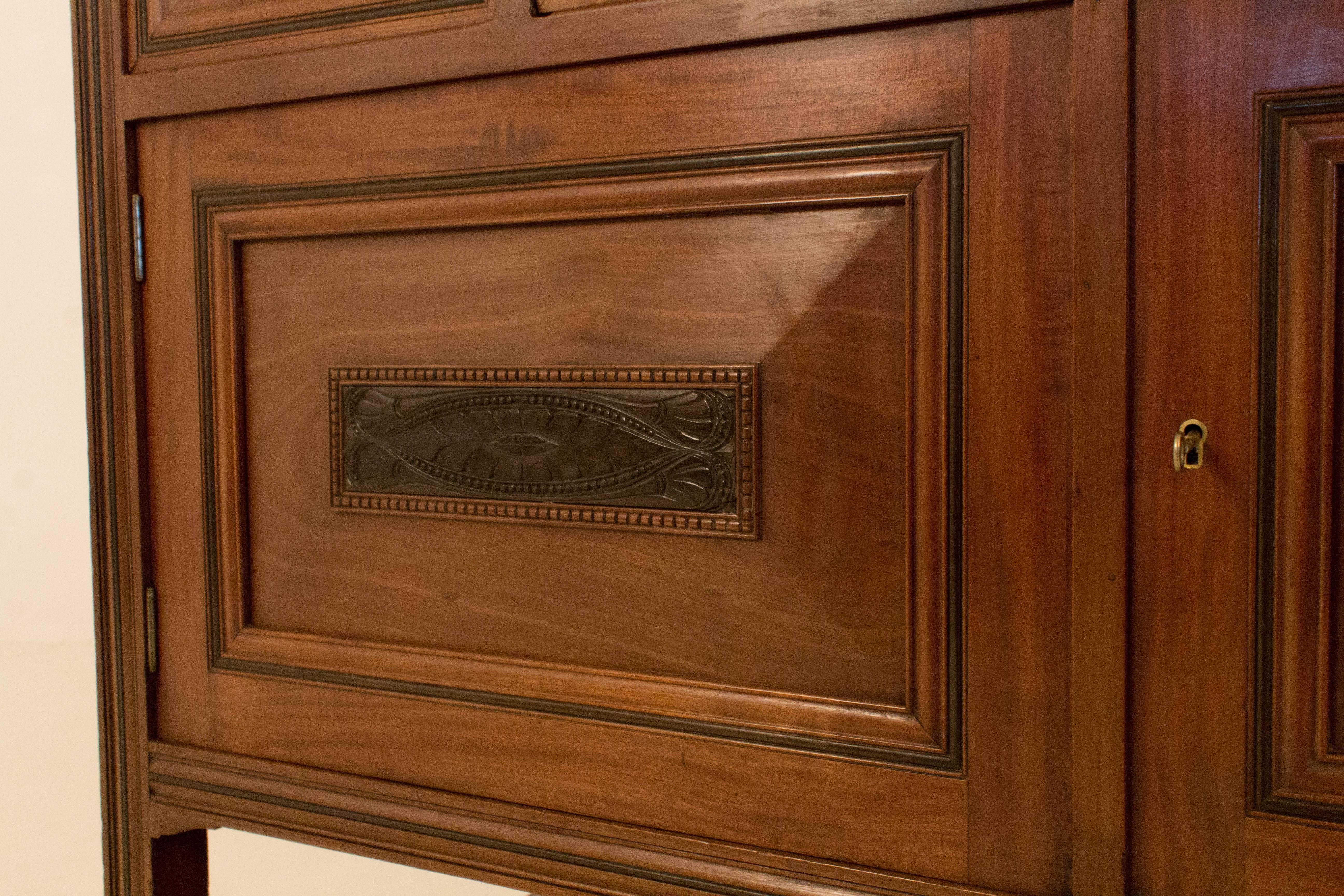 Elegant Art Nouveau sideboard attributed to KPC de Bazel.
Solid mahogany and Macassar ebony knobs and details.
Lock and key are in good working order.
In good original condition.