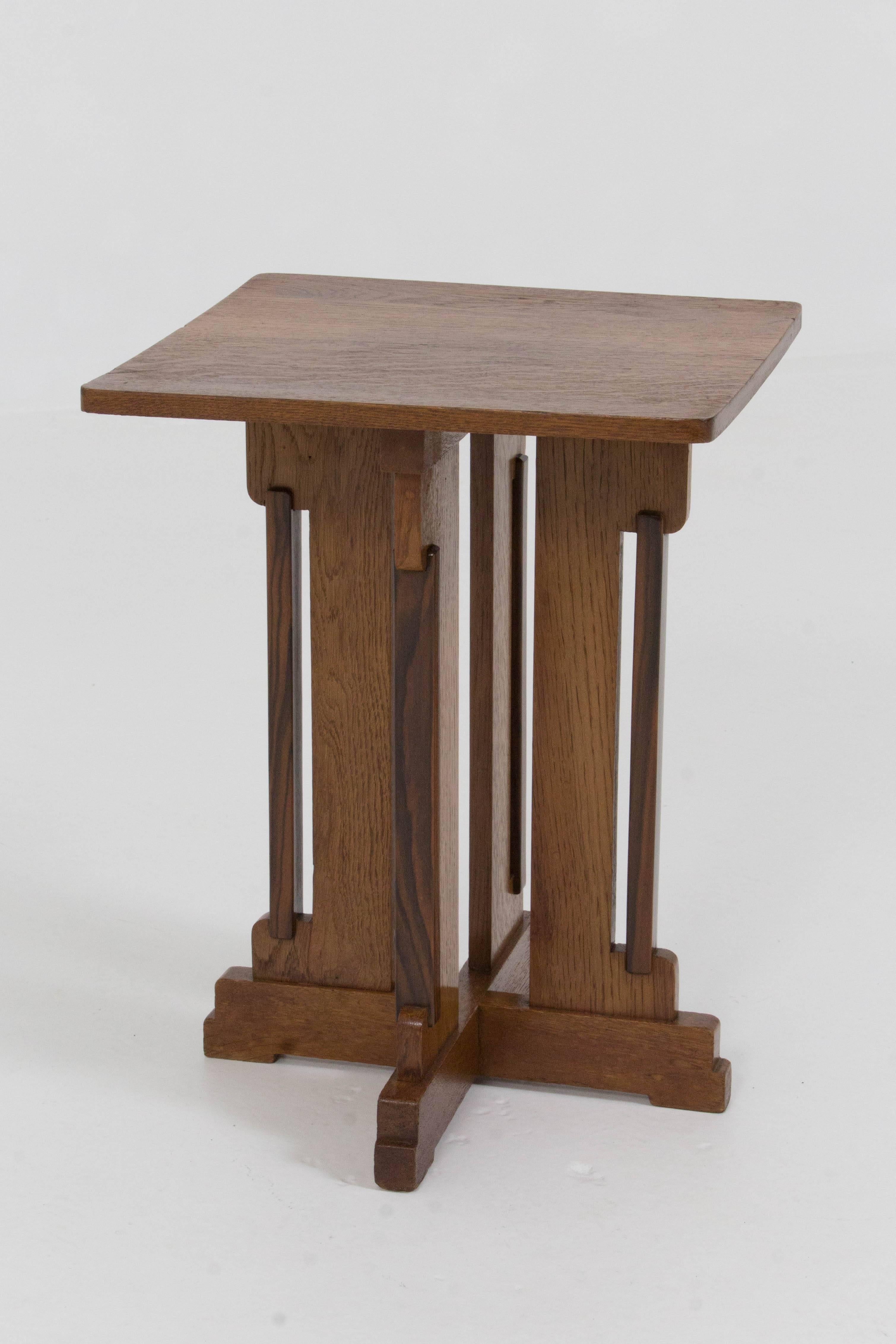 Stylish Art Deco Haagse school occasional table by P.E.L. Izeren for Genneper Molen, 1920s.
Solid oak with solid ebony Macassar linings.
In good original condition with minor wear consistent with age and use,
preserving a beautiful patina.