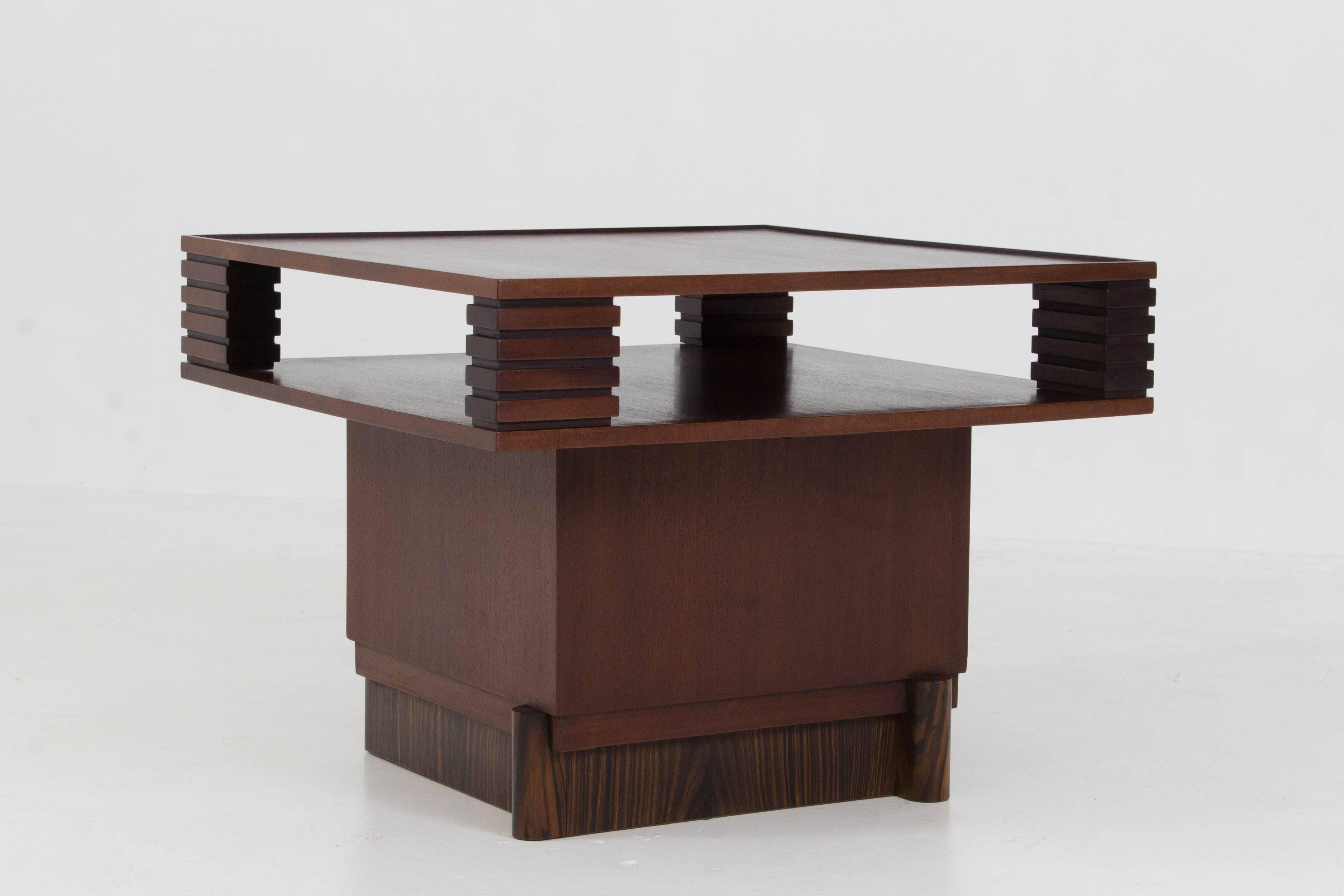 Stunning Art Deco Haagse School coffee table by J.Roodenburgh, 1920s.
Mahogany with Macassar ebony details.
Striking design from every angle.
In very good condition with minor wear consistent with age and use,
preserving a beautiful condition.