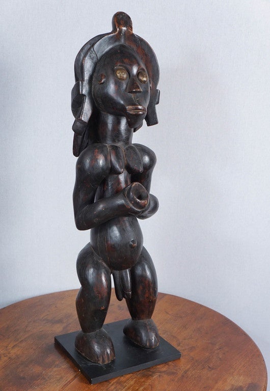 Referred to as Byeri, this figure is a symbolic evocation of the ancestor, as well as a source of magical protection to the Fang people.
