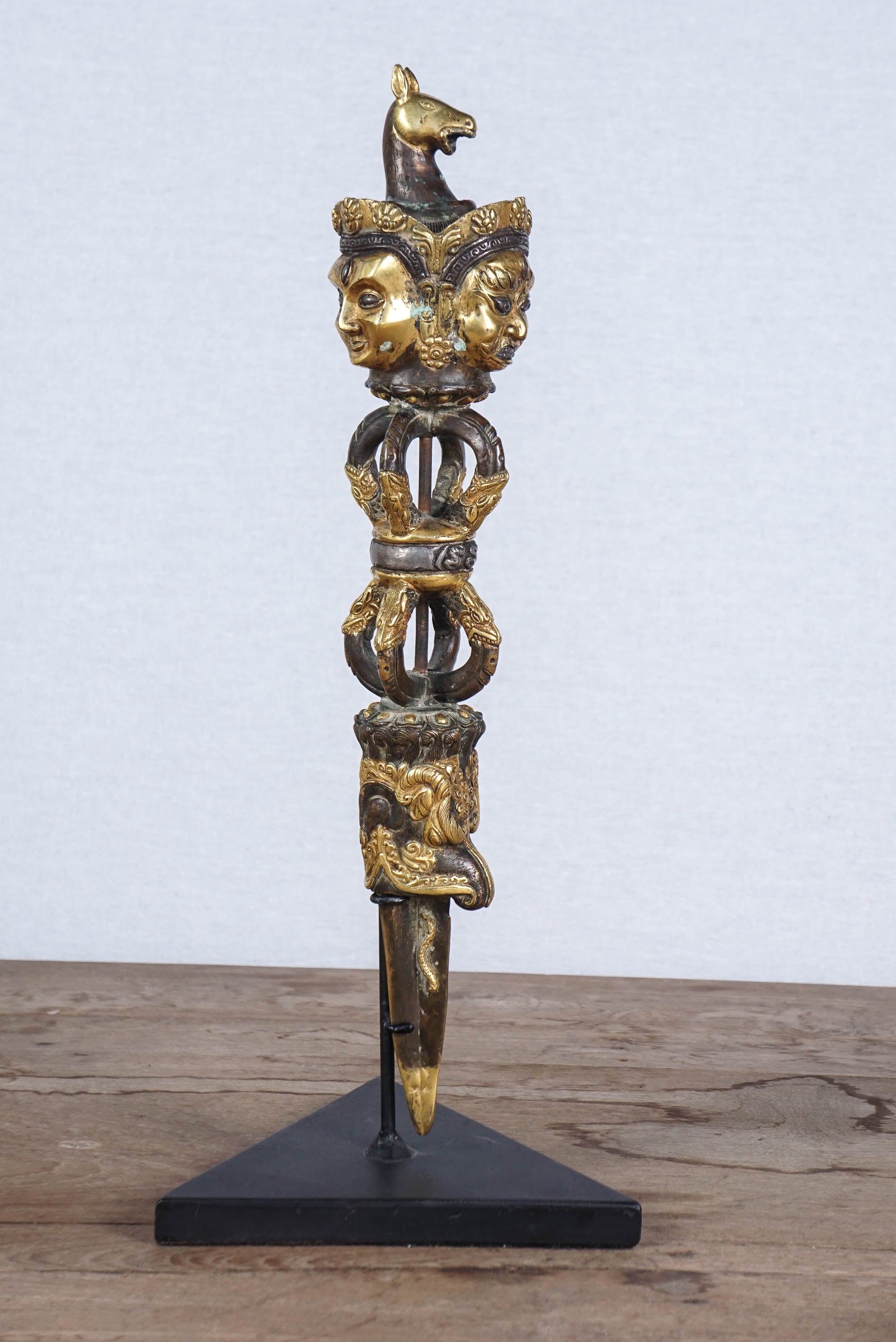 A purba (Tibetan: phur ba. Sanskrit: kila) is a three edged peg usually made from metal or wood. They are sometimes described as daggers with three blades. The best of the metal ones are constructed from Meteorite iron. Sandalwood is also popular.