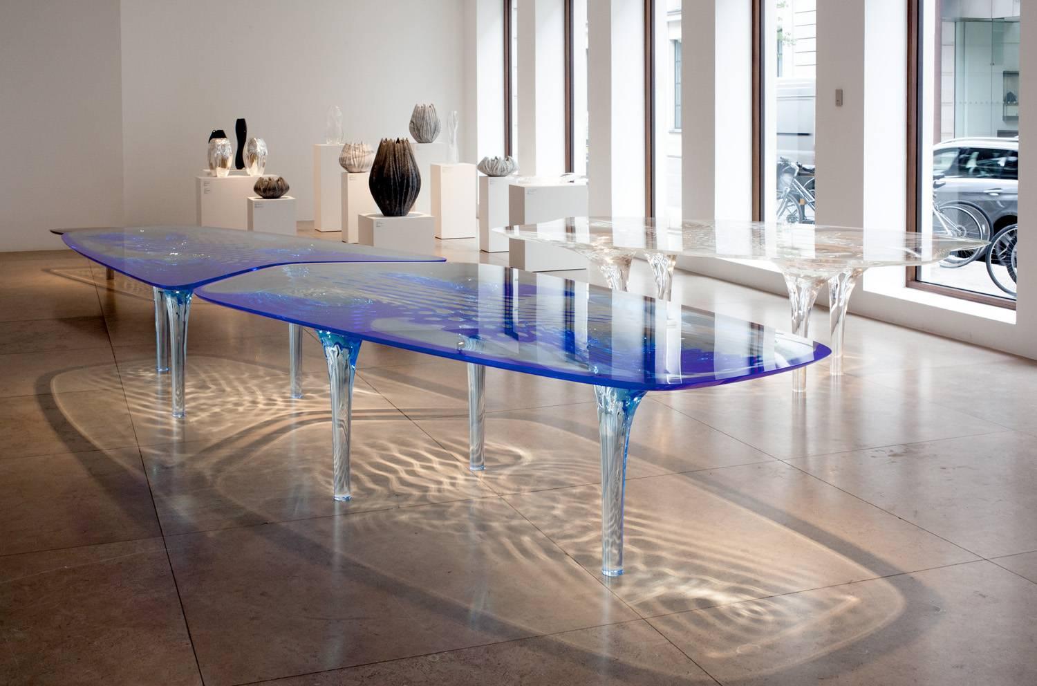 Zaha Hadid.
Dining table 'Liquid Glacial Colour', 
2012.
Acrylic.
Overall: H 75 x L 500 x D 140 cm / H 29.5 x L 196 x D 55 in.
Small section: H 75 x L 250 x D 140 cm / H 29.5 x L 98 x D 55 in.
Large section: H 75 x L 280 x D 140 cm / H 29.5 x