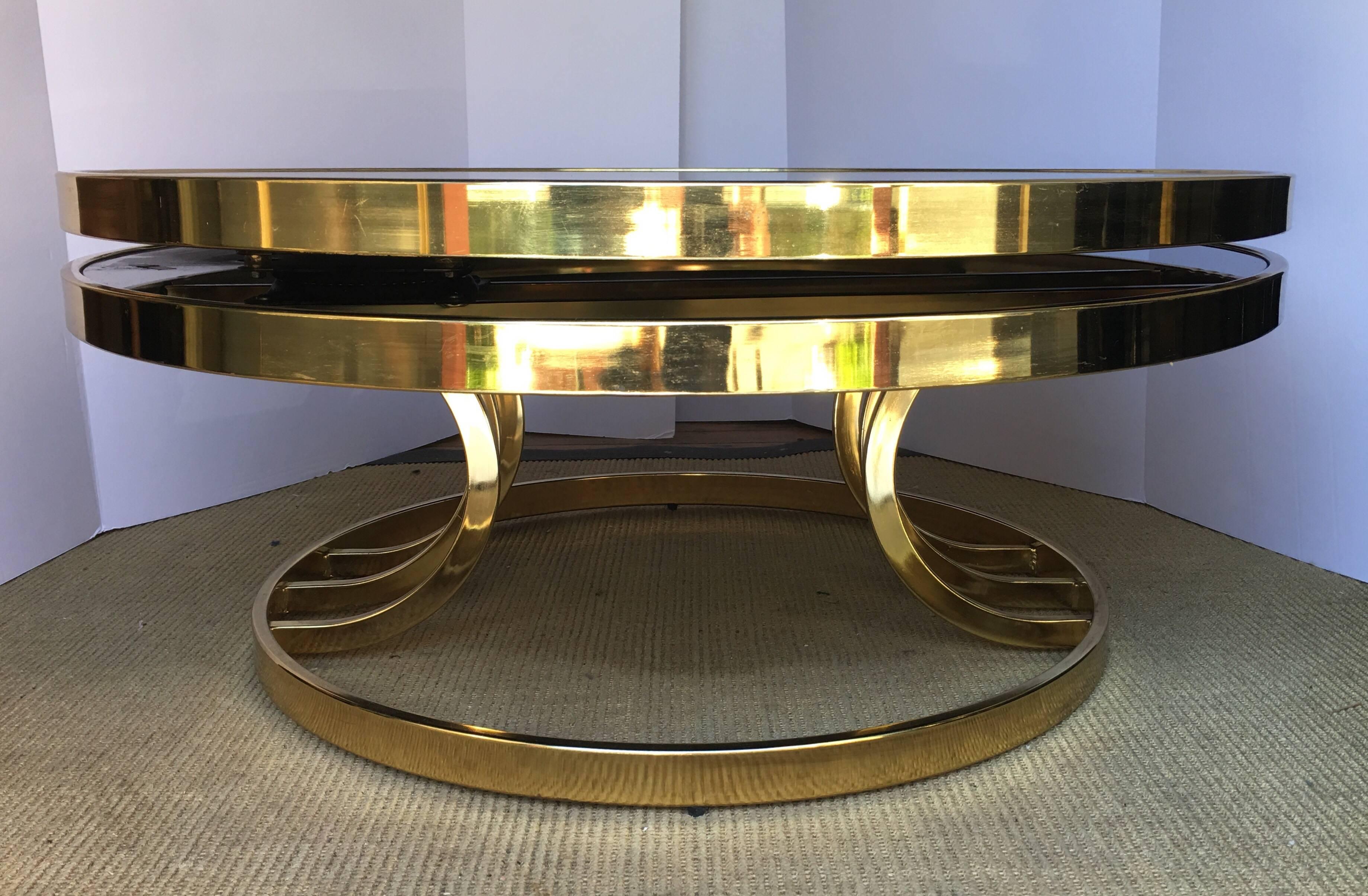 Mid-Century Modern Design Institute America Round Two-Tier Swivel Brass and Glass Cocktail Table