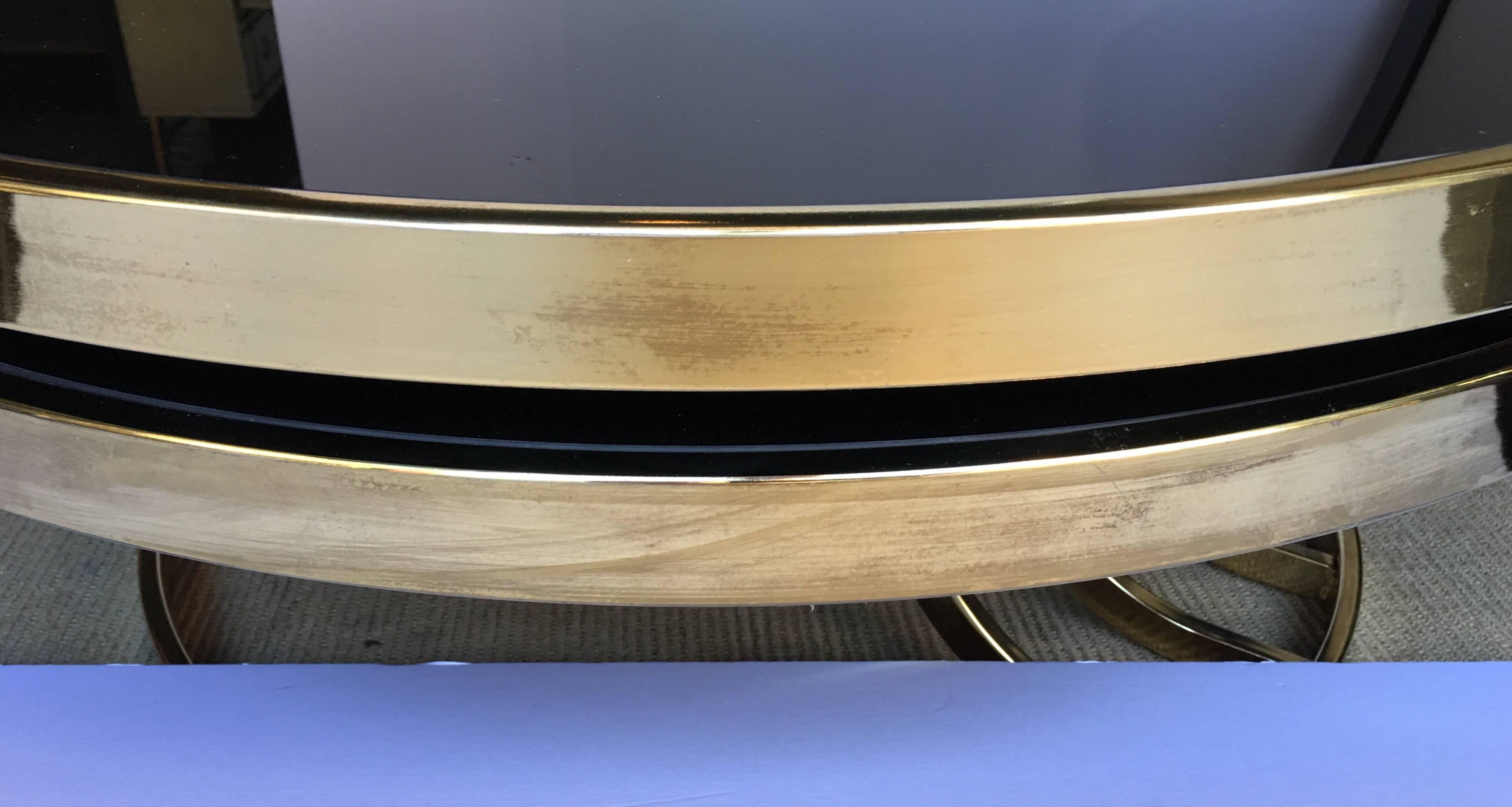 Late 20th Century Design Institute America Round Two-Tier Swivel Brass and Glass Cocktail Table