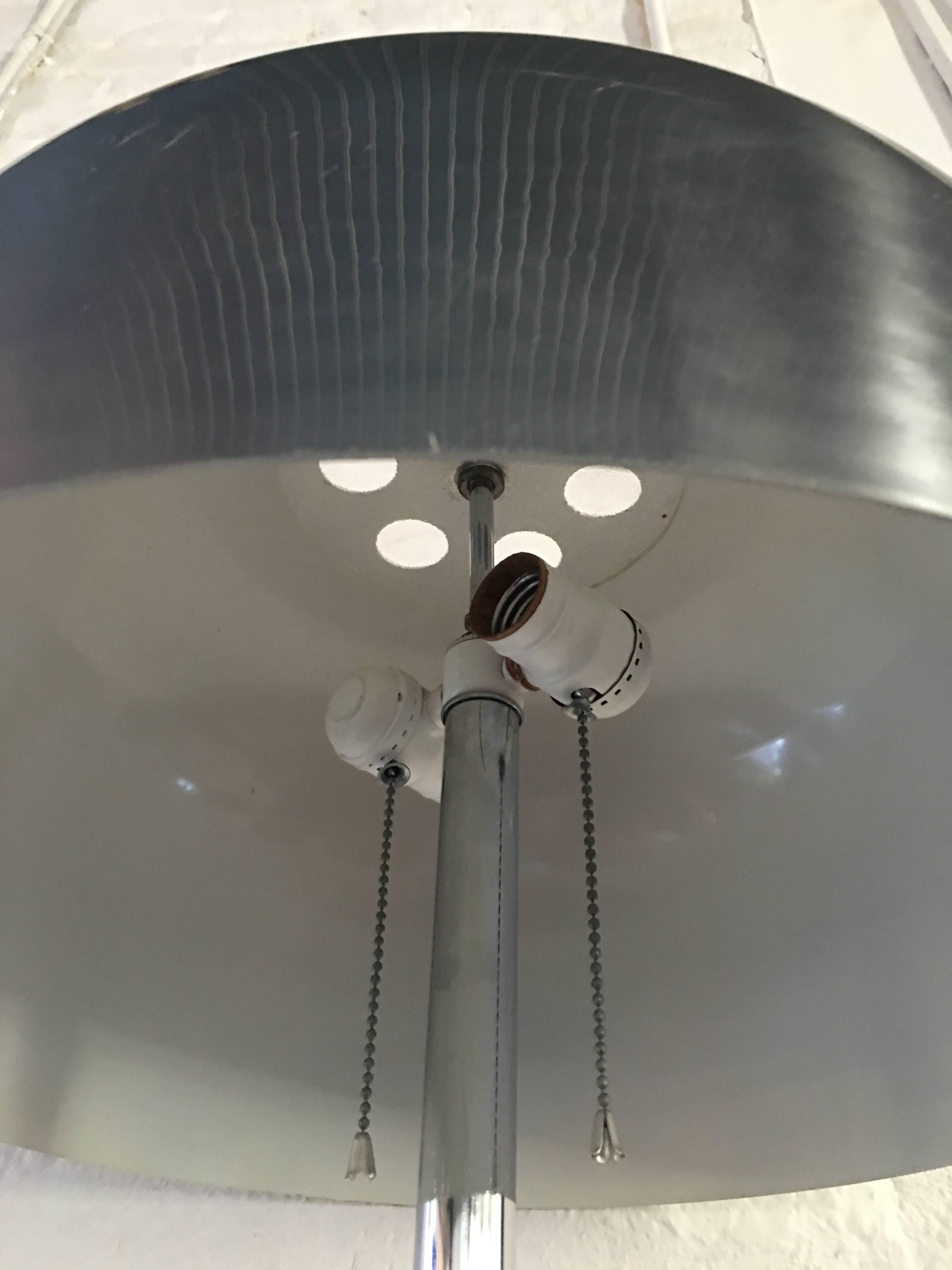 Modern chrome floor lamp by Laurel Lamp Company with a removable dome shaped shade.  Knoll Associates sticker on base.  Originally on display at Knoll's NYC offices.  Original wiring in working condition.  