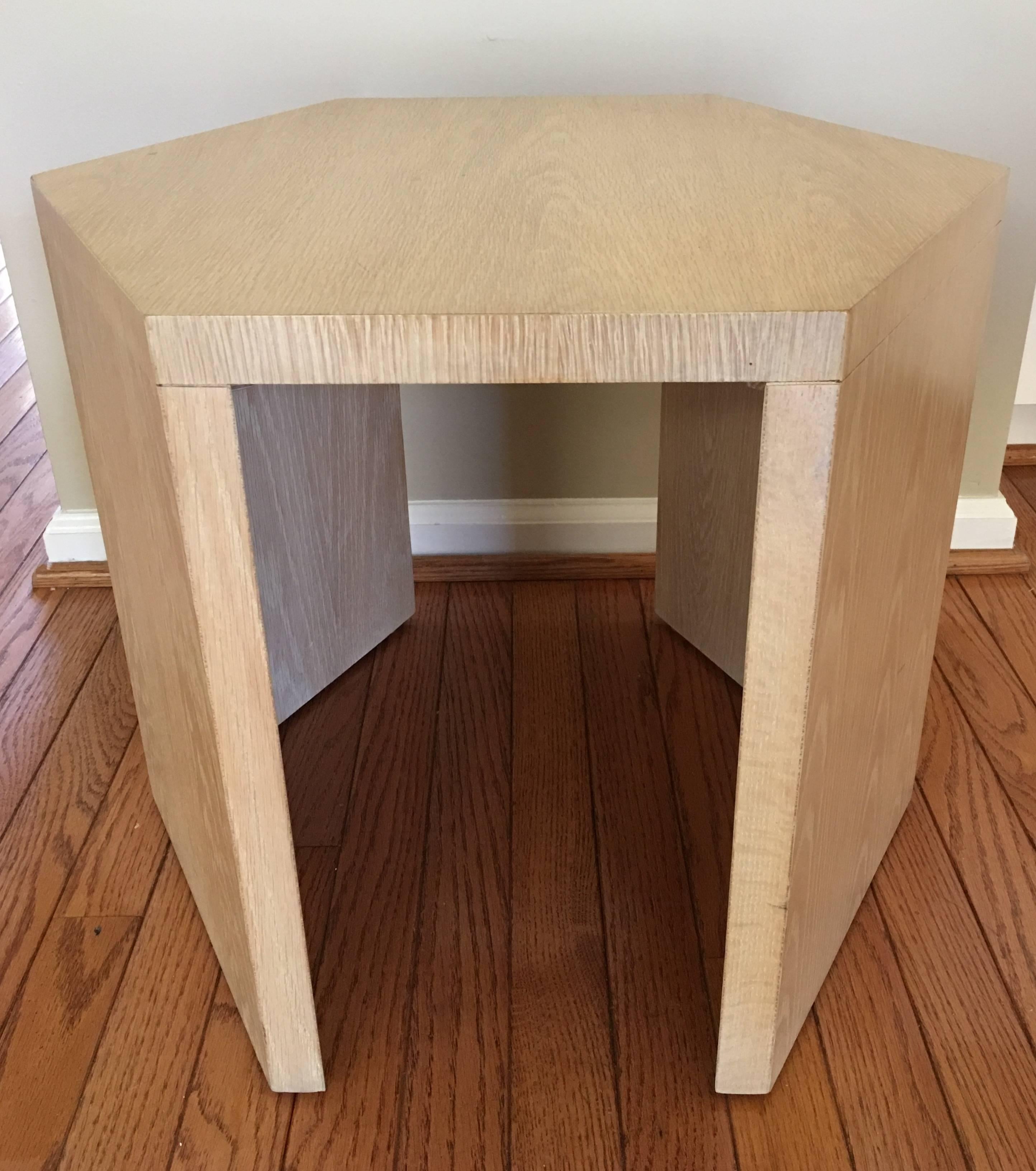 Solid oak sculptural side table by Jay Spectre for Century Furniture. Hexagon shape with two open sides. Can be used as a small cocktail coffee table. Coordinating Eclipse lounge chair also available.