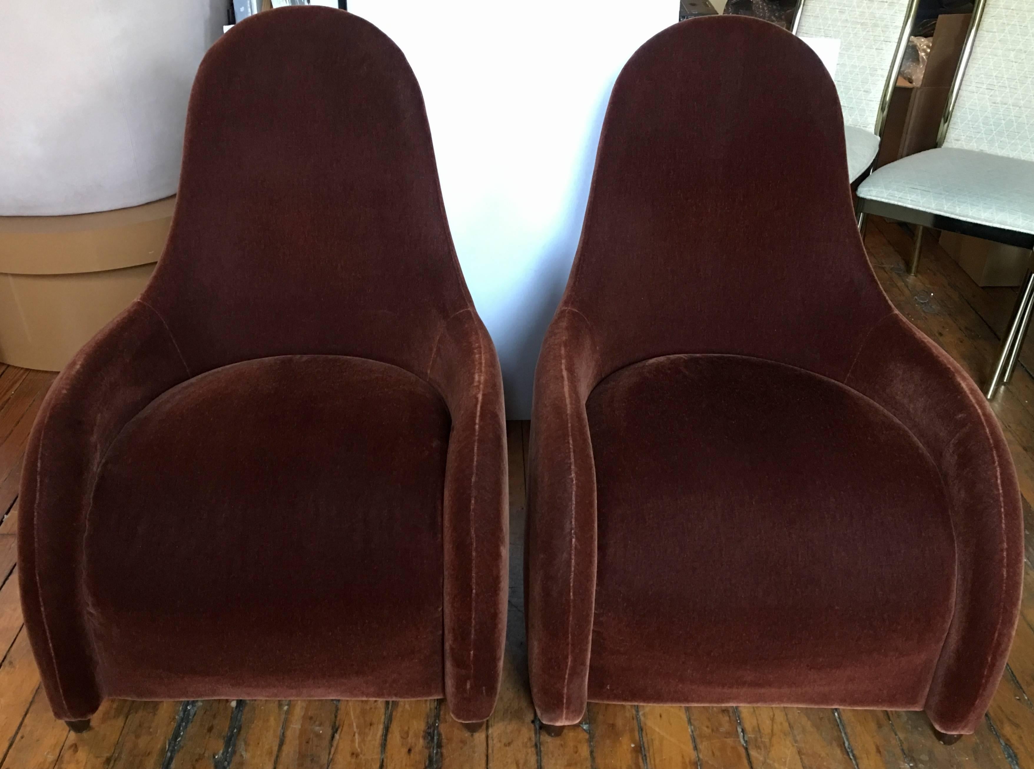 Pair of classical sculptural modern lounge chairs designed by Mitchell Pickard for Brueton Industries. Flowing and curved frames feature original brown tone mohair upholstery. Original upholstery labels dated 2009.

Total of four chairs available.