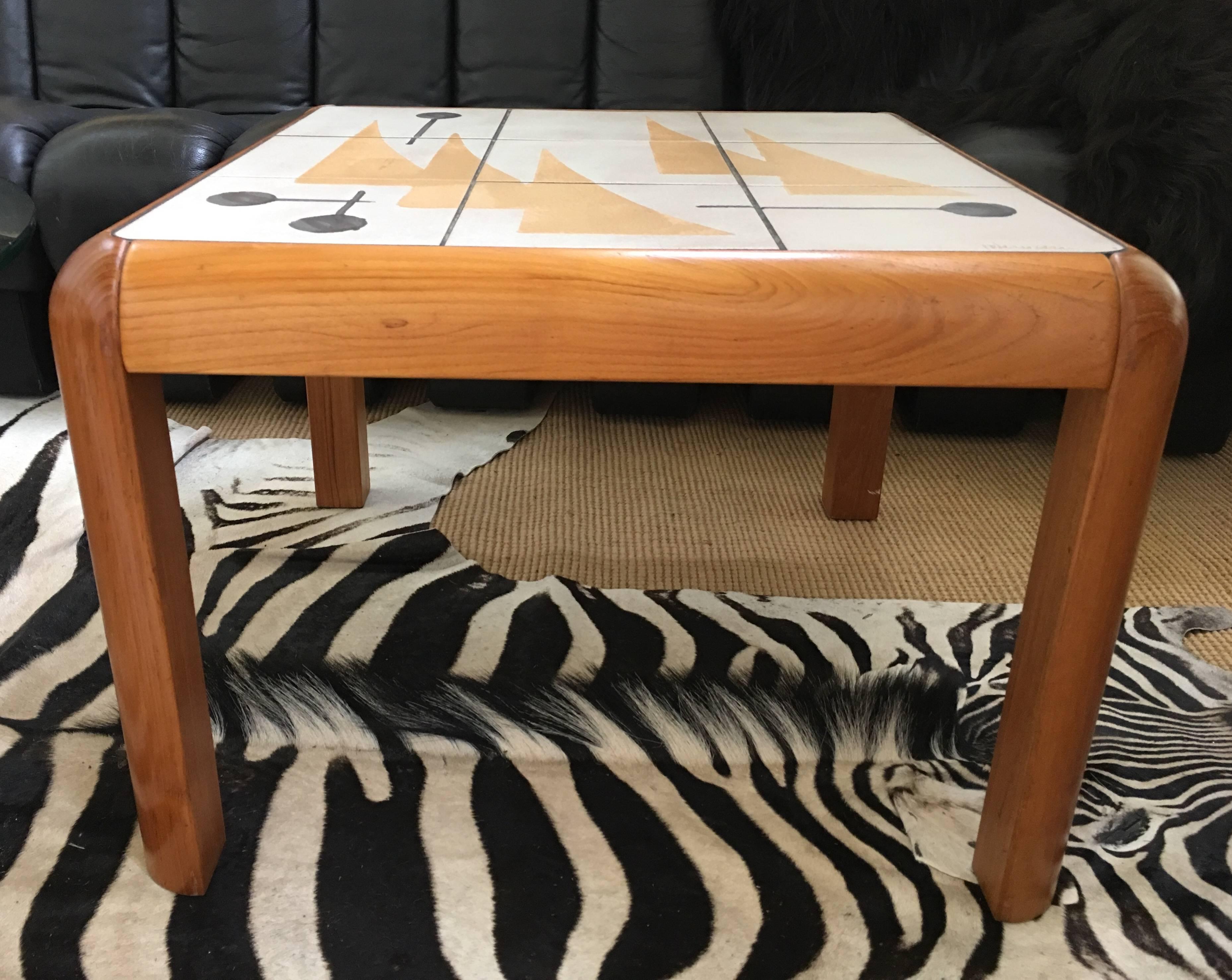 Danish Mid-Century Modern side table by Gangso Mobler Furniture with hand painted abstract tiled top by Danish pottery ceramic tile designer Poul Hermann Poulsen. Signed 