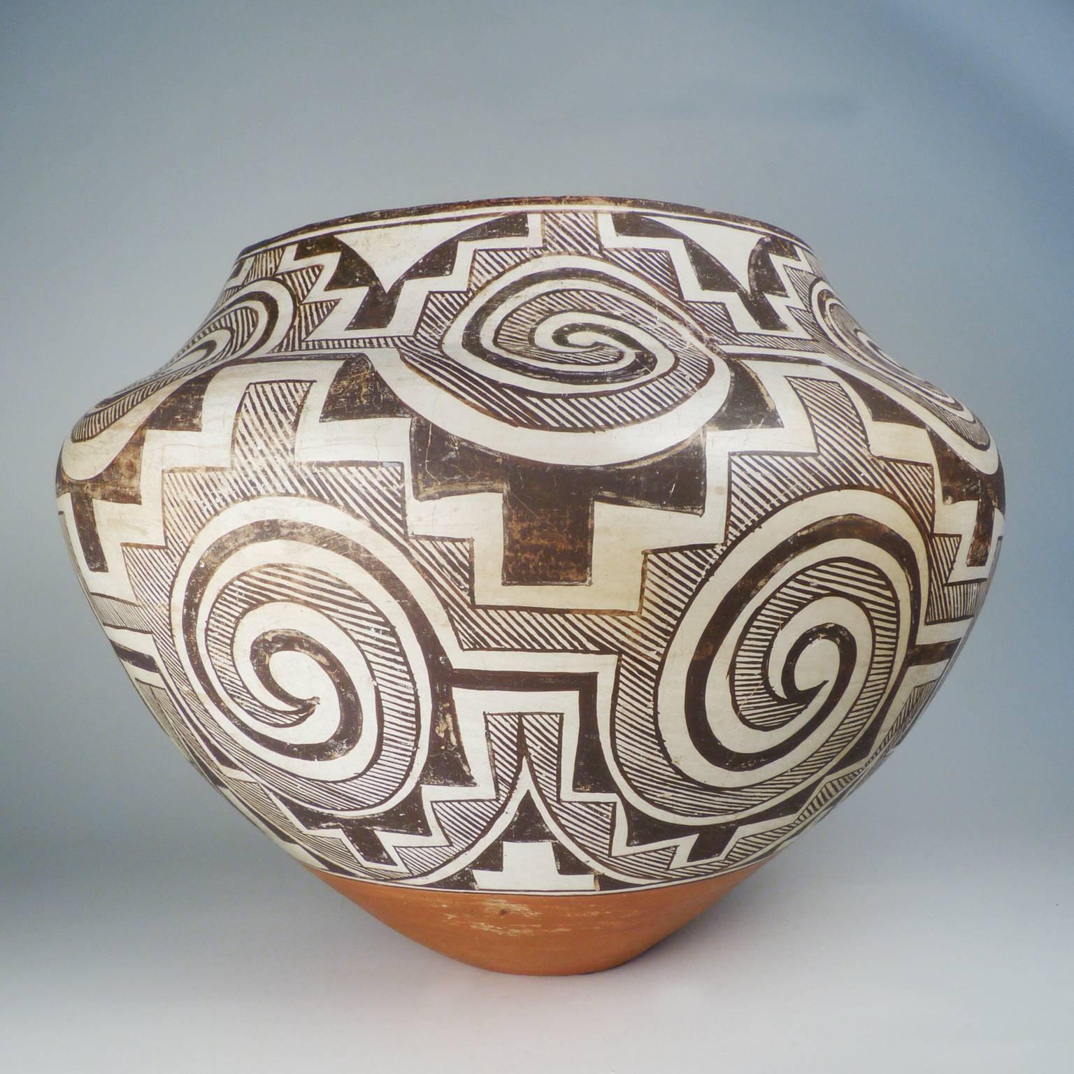 Attributed to Mary Histia, one of the best known potters from Acoma Pueblo at the beginning of the 20th century. Unusually large, the intricate and captivating design is similar to the Tularosa pottery tradition from the Prehistoric era.