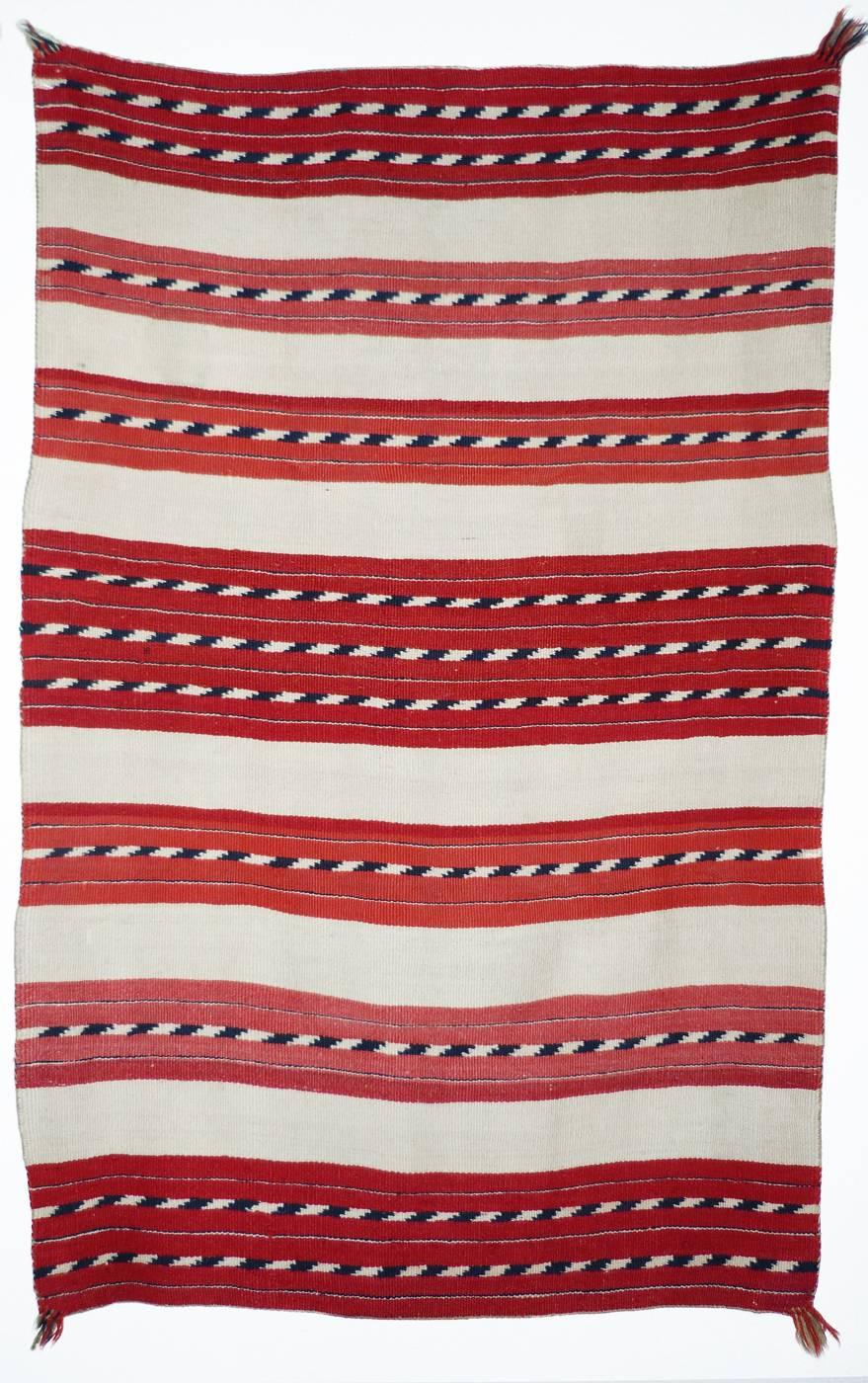 Shiprock Santa Fe is pleased to offer a rare opportunity for the discerning collector; a significant collection of late Classic Navajo child’s blankets.
The rarest and most sought after of native American weaving, the child’s blanket shares many