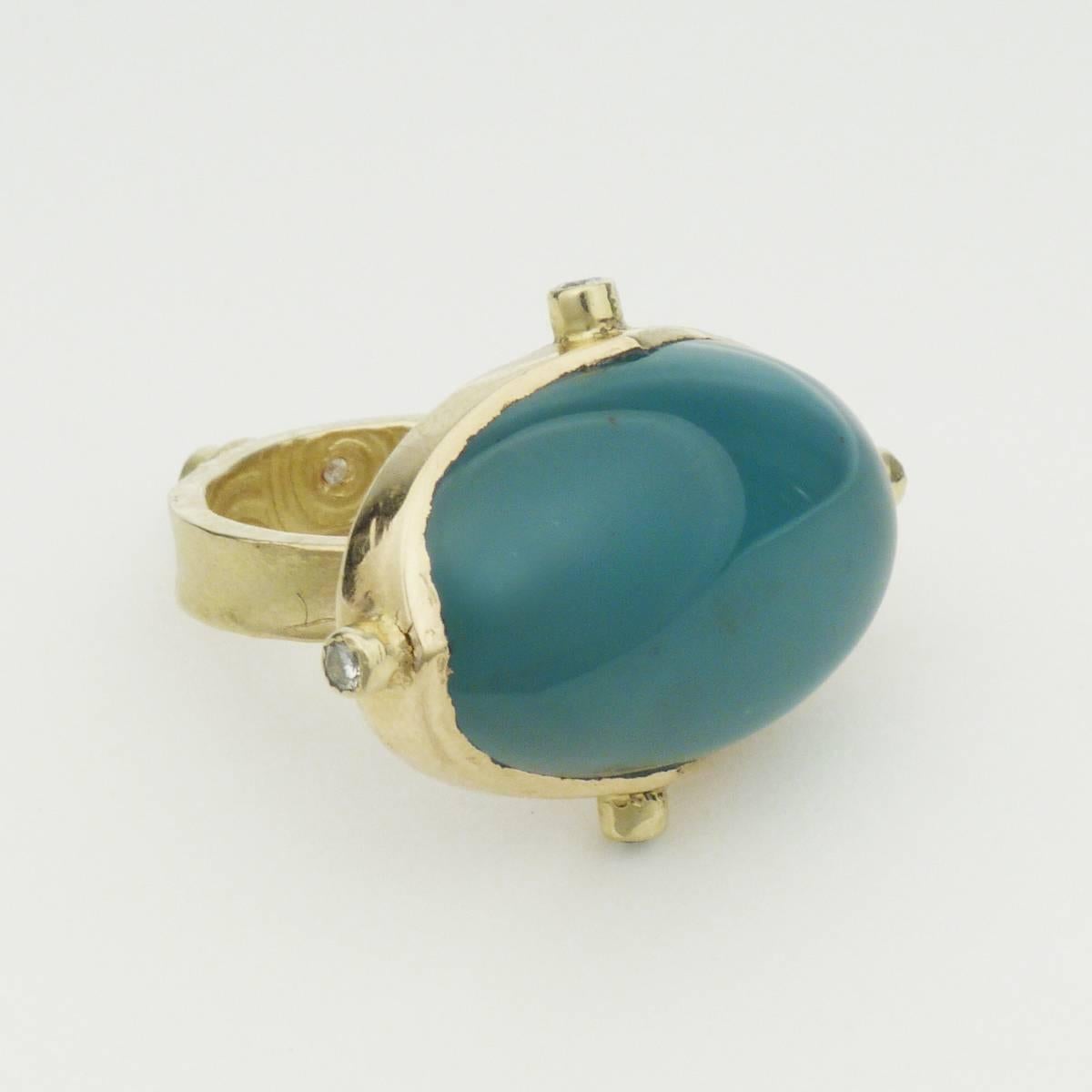 Native American master jeweler Keri Ataumbi draws inspiration from the natural world and from a variety of artistic traditions across the world. This ring has a Byzantine sensibility and wonderful proportions. Made of 18-Karat gold, chalcedony and