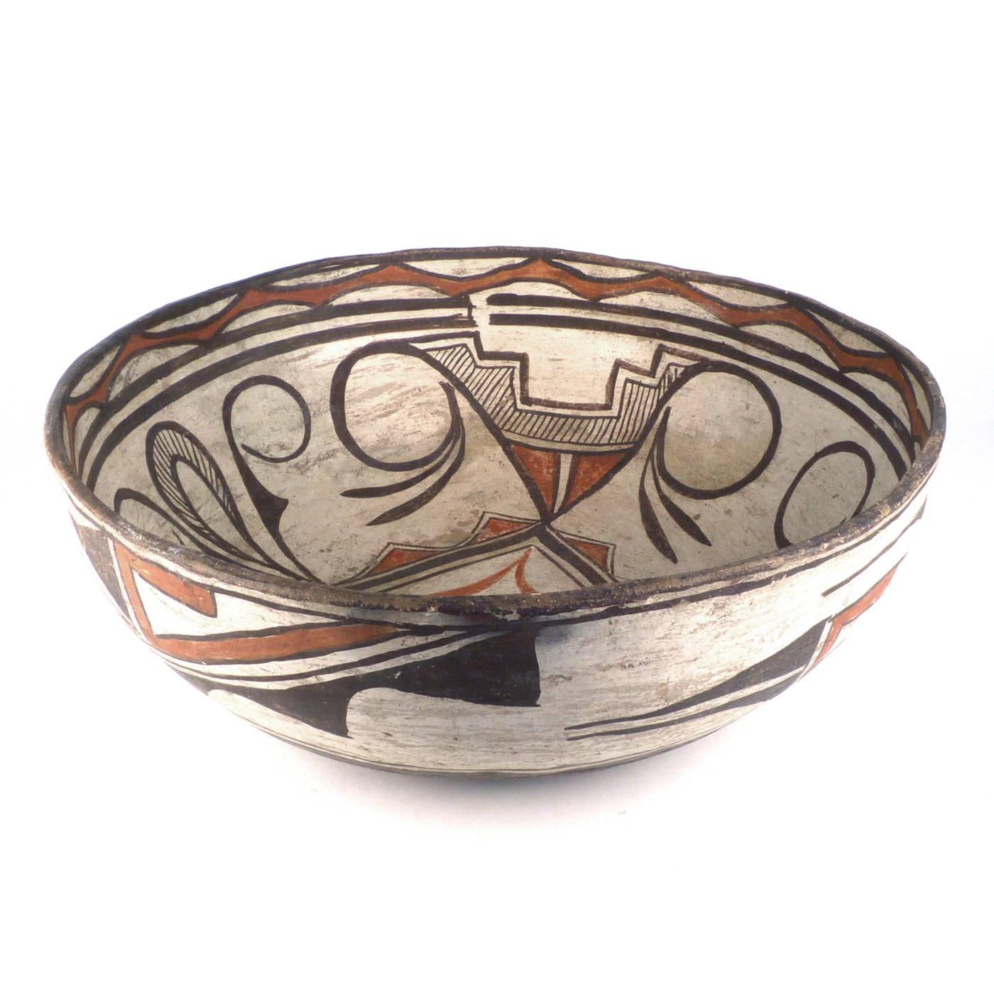 A traditionally made and fired bowl from Zuni Pueblo in New Mexico, dating from the turn of the 20th century. Measures: 14