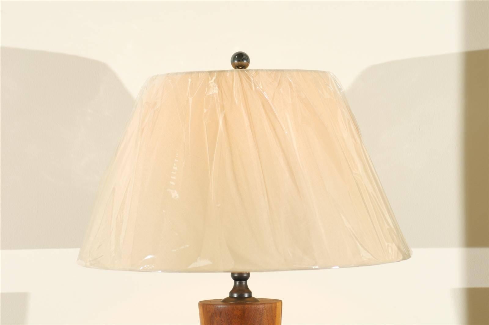 American Monumental Pair of Walnut Hourglass Lamps in the Style of Phillip Lloyd Powell For Sale