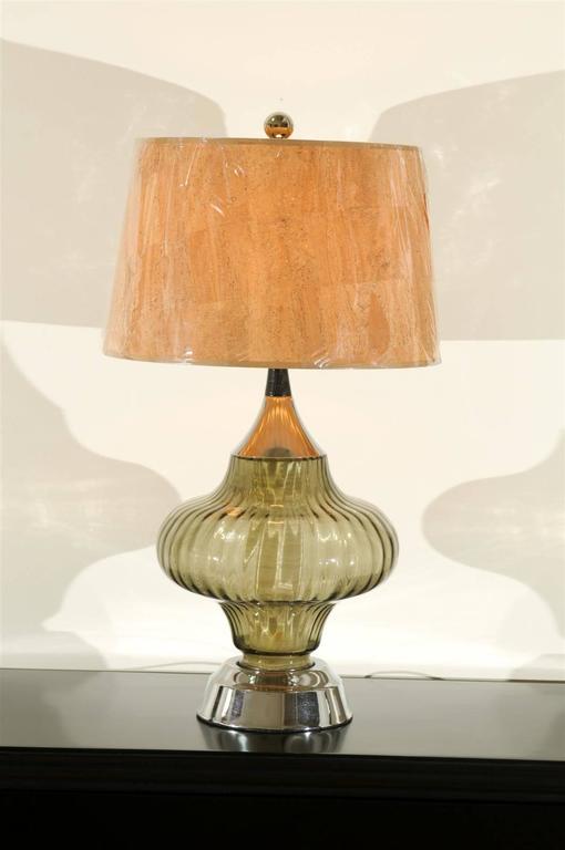 A stellar pair of vintage modern lamps, circa 1970. Fluted smoked glass with chrome and black lacquer accents. Fabulous cork shades add warmth and texture. Exquisite jewelry! Excellent restored condition. The lamps have been rewired using clear