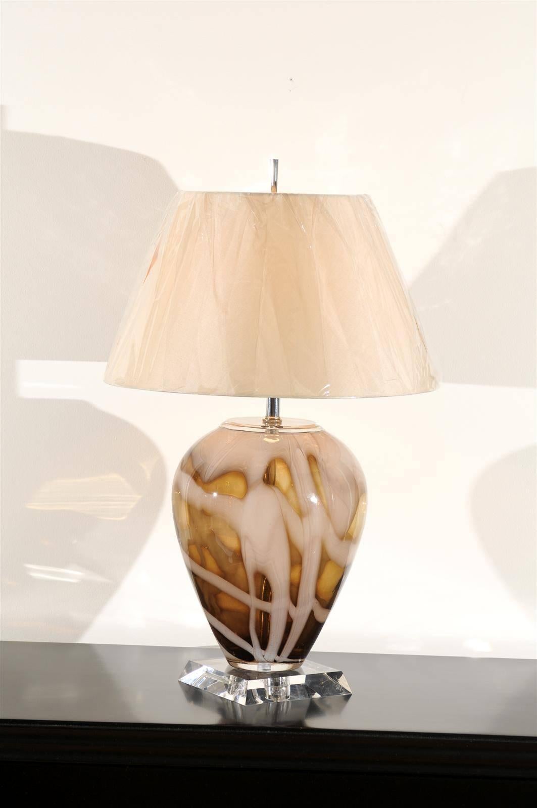 A beautiful pair of blown glass vessels as lamps. Fabulous form, scale and color. The pieces are consistent with Eastern European art glass production of the 1980s and 1990s. Exquisite jewelry! Excellent restored condition. Wired using clear cord;