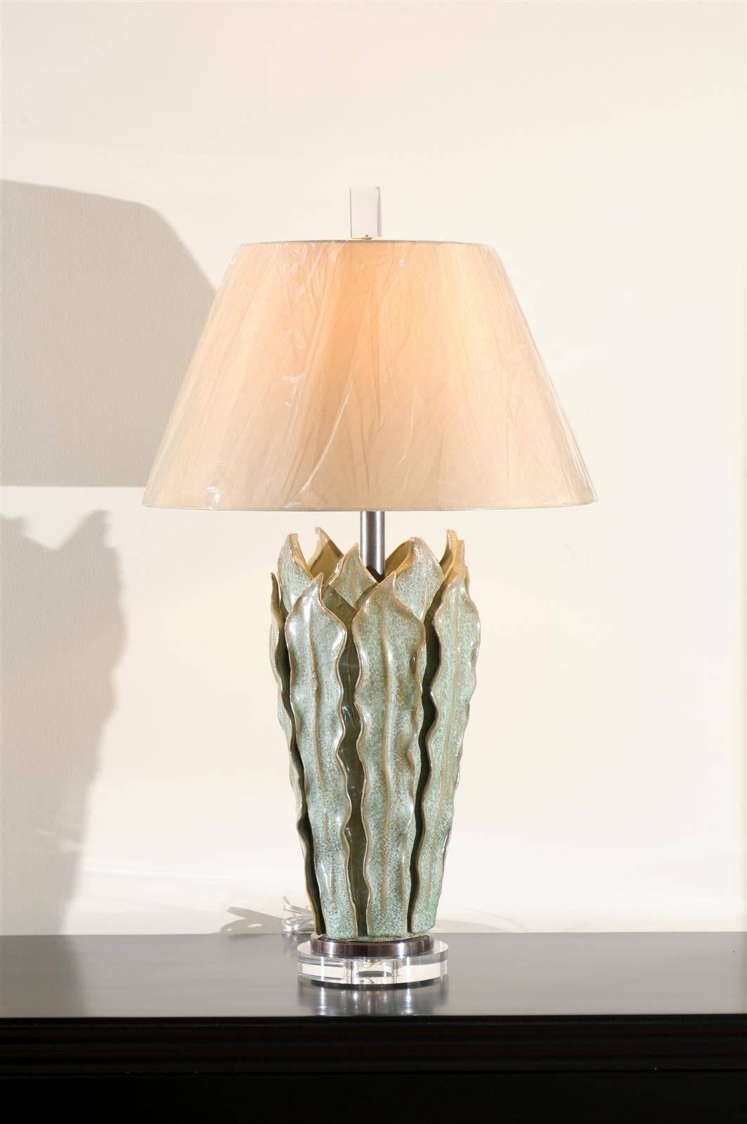 These magnificent lamps are shipped as photographed and described in the narrative. They are custom built using materials of the highest quality and are shipped complete with the new shades, harps and finials shown in the photos.

A fabulous pair of