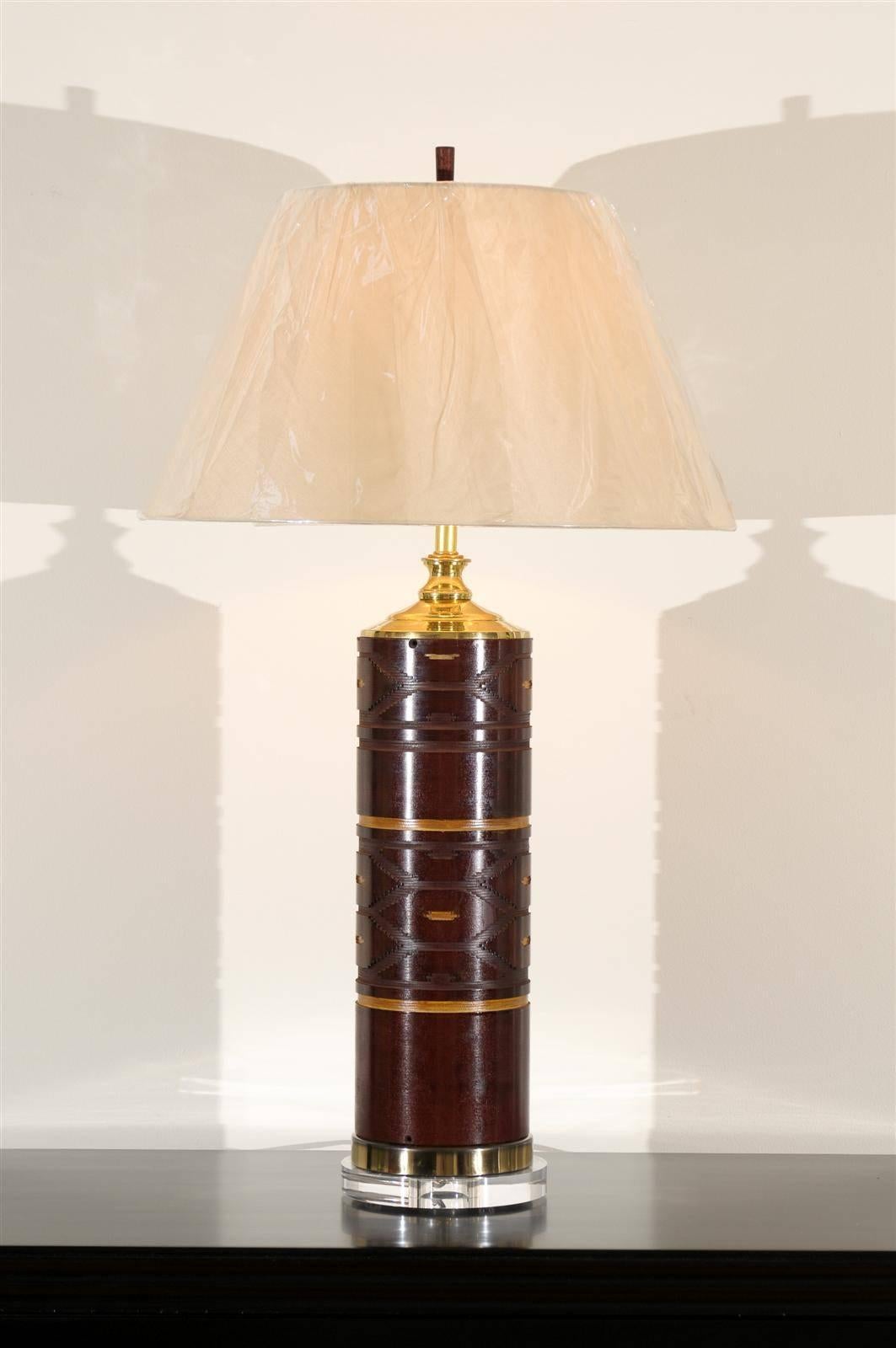 An exceptional pair of vintage wallpaper rollers as custom lamps. The pieces portray the rich look of aged leather. Fabulous detail and scale. Exquisite jewelry! Excellent restored condition. The rollers have been professionally cleaned and