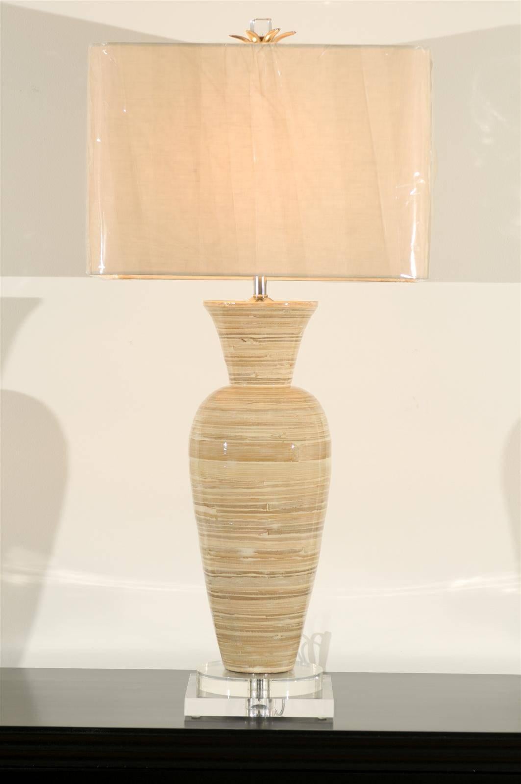An exquisite pair of bamboo vases as custom-made lamps. Beautiful shape, scale, texture and range of color. Exceptional weight and craftsmanship. Stunning jewelry! Excellent restored condition. Wired using clear cord; new nickel three-way sockets