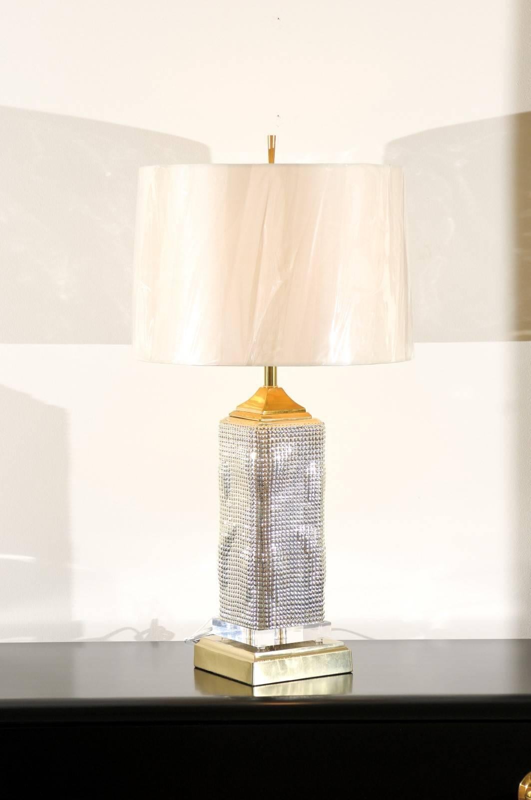 An absolutely fabulous and unique pair of custom-made Skyscraper lamps. Vintage blown mercury glass vessels with beautiful color, sheen and texture. Vintage solid brass accents along with a new museum quality Lucite plinth. Exquisite jewelry!