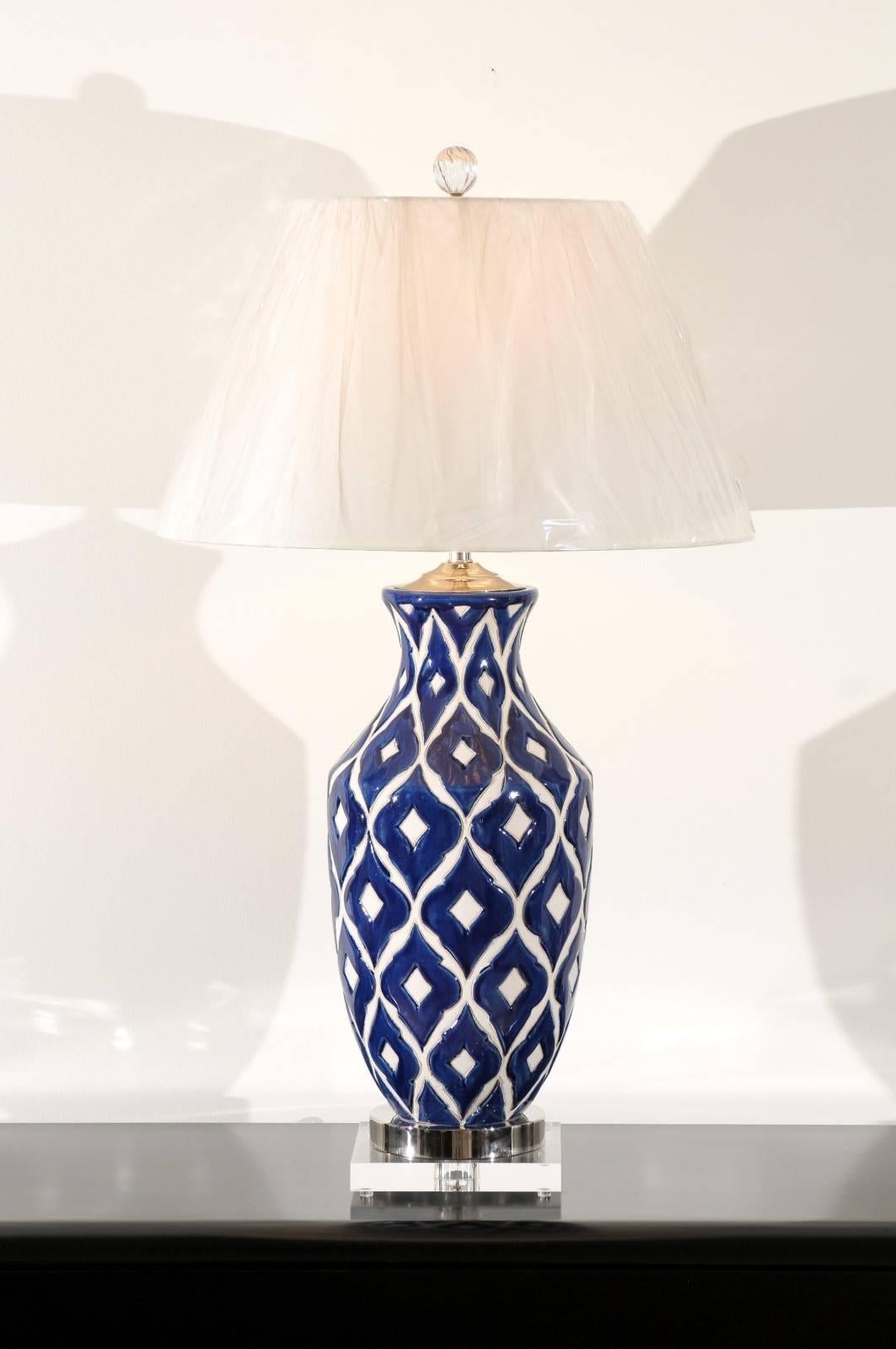 Striking pair of large-scale ceramic lamps with accents of nickel and Lucite A beautiful pair of large-scale ceramic vessels as custom lamps. Fabulous form with graphic motifs. Exquisite jewelry! Excellent restored condition. Wired using clear cord: