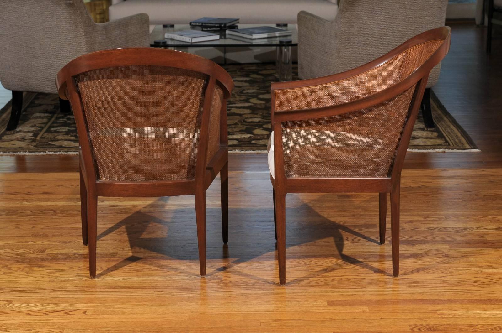 American Elegant Restored Pair of Walnut Cane Chairs by Kipp Stewart for Directional For Sale
