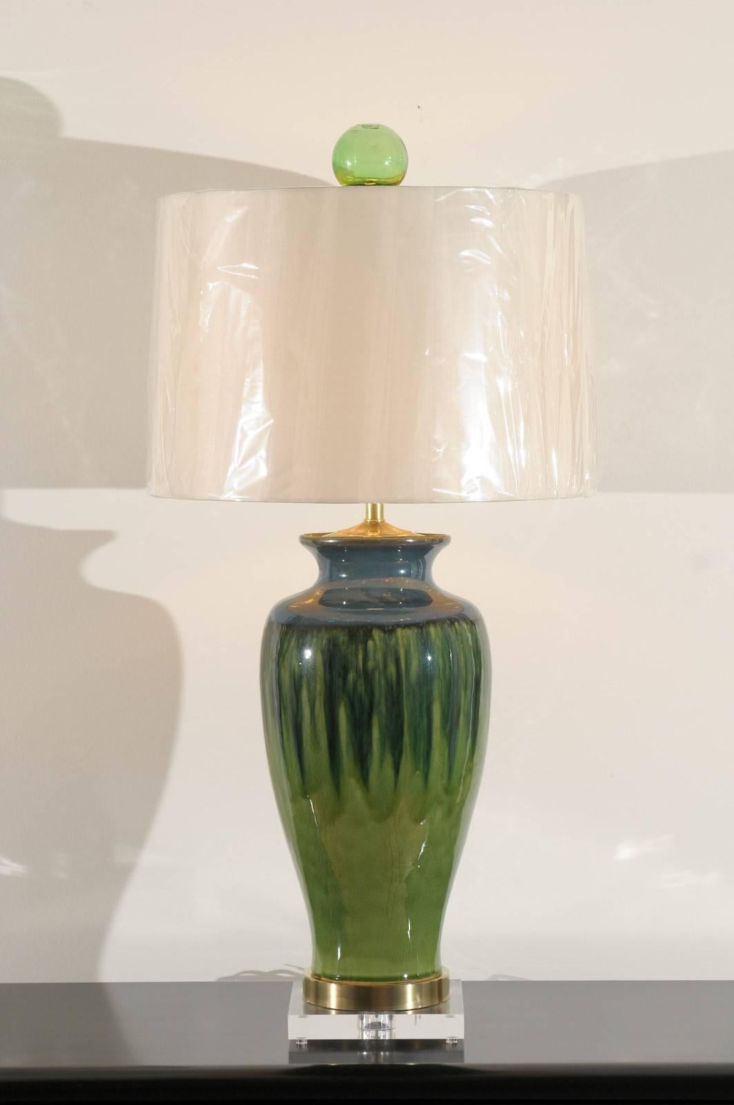 These magnificent lamps have been professionally restored and are shipped as photographed and described, complete with new shades, harps and finials.

A fabulous pair of large-scale vessels as custom lamps. Beautiful drip glaze ceramic form with