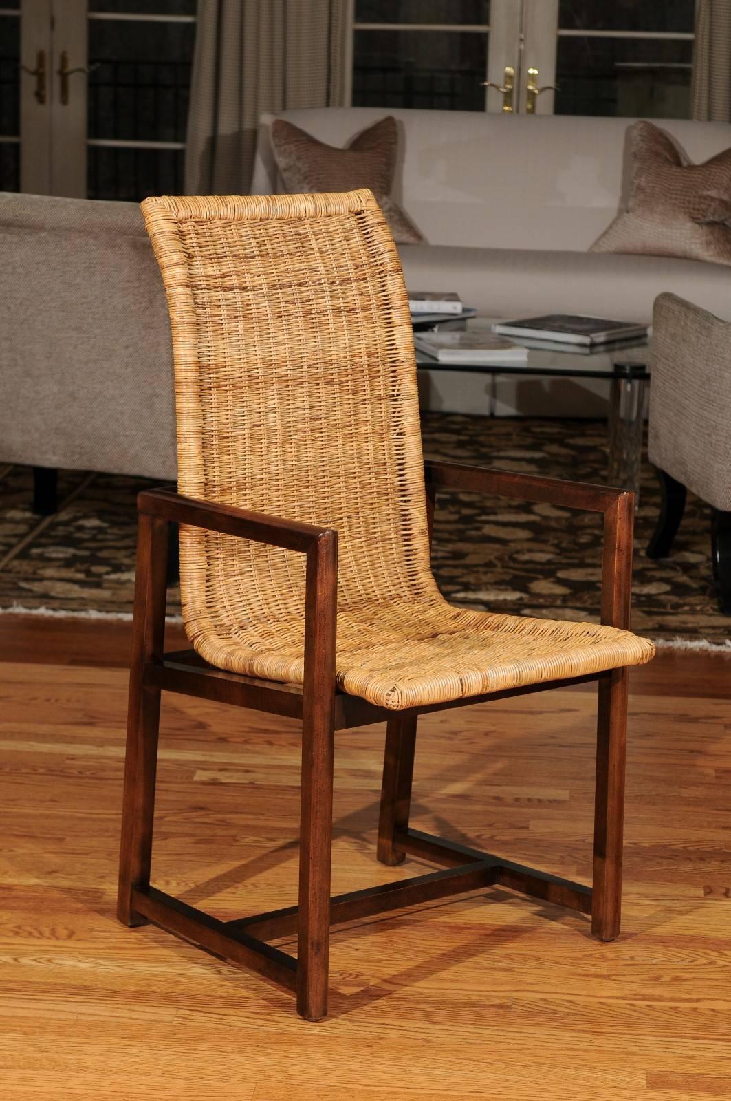 A beautiful set of vintage high-back dining chairs, circa 1980. Exceptionally crafted beech base finished in a walnut stain with a lovely woven wicker seat. All chairs are matching arm. Fabulous warmth and texture. Exquisite jewelry! Excellent