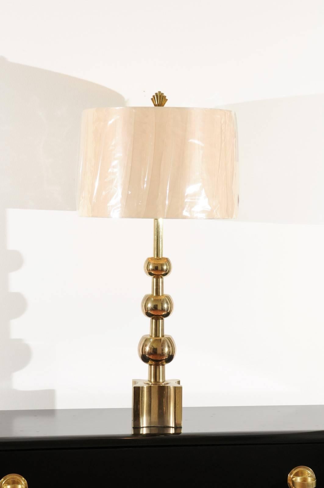 Mid-20th Century Iconic Restored Pair of Brass Graduated Ball Lamps by Stiffel