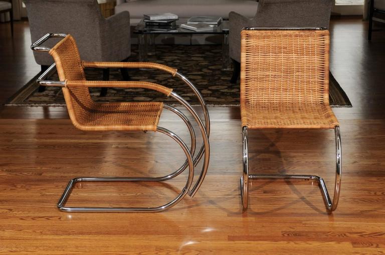 Pristine Set of Eight Italian Wicker Chairs in the Style of Mies van