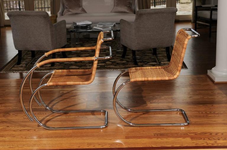 Pristine Set of Eight Italian Wicker Chairs in the Style of Mies van