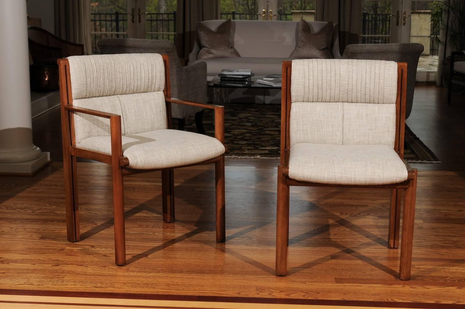 A fabulous restored set of six (6) difficult to find dining chairs by famed designer John Saladino from his limited production Facade collection for Baker Furniture, introduced in 1985. There are two (2) host and four (4)  side chairs. Expertly