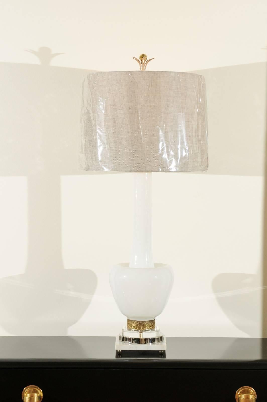 An exceptional pair of large-scale blown Murano glass lamps. Stunning cream form atop a fabulous custom designed four-step base of marble, nickel, Lucite and accented with an embossed brass cuff. Custom-made petal and ball finials in nickel and