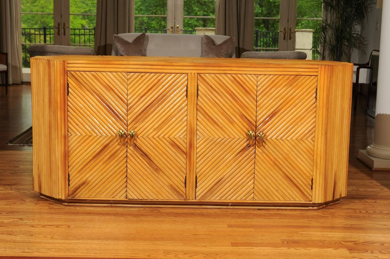 This magnificent chest is shipped as professionally photographed and described in the listing narrative: Completely Installation Ready.

An exceptional vintage bamboo cabinet or buffet, circa 1970s. Diagonally applied split bamboo veneer over solid