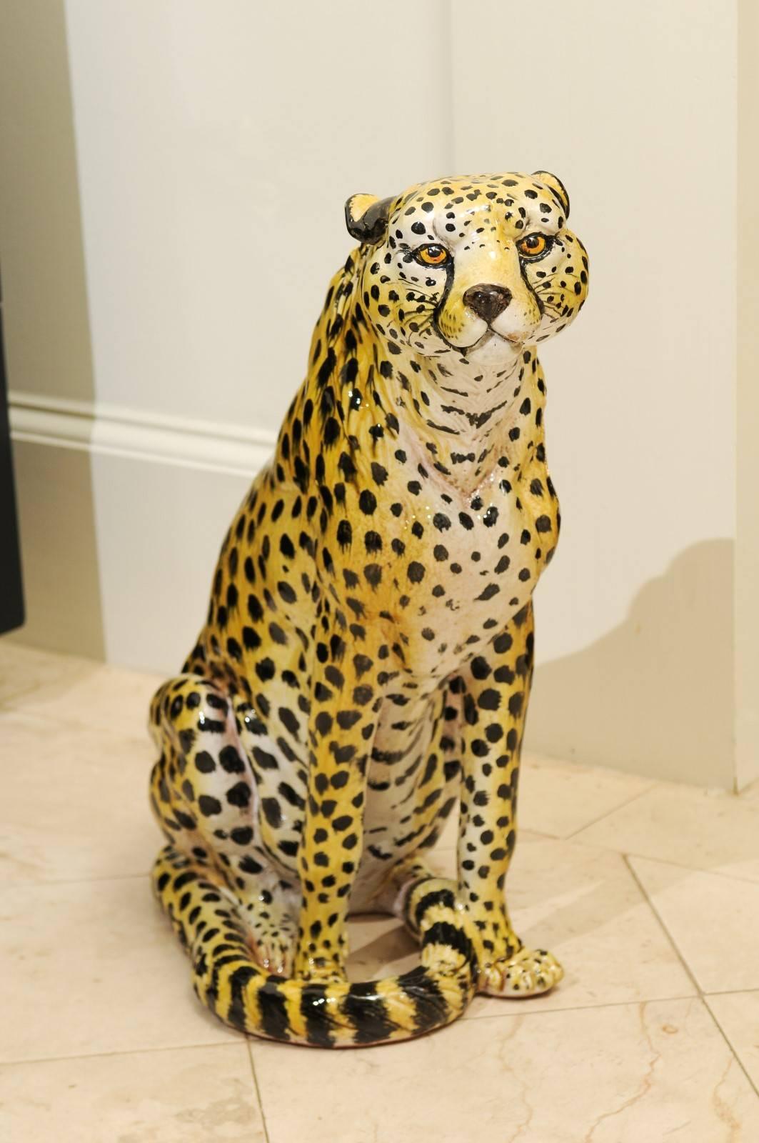 An off-the-chain Italian glazed terracotta Cheetah, circa 1970. Fantastic form and facial expression with a range of color will bring a smile to your face. Exceptional weight, quality and craftsmanship. Exquisite jewelry! Excellent vintage