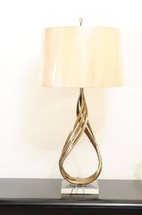 Stellar Restored Pair of Iconic Brass Flame Lamps by Chapman, circa 1993