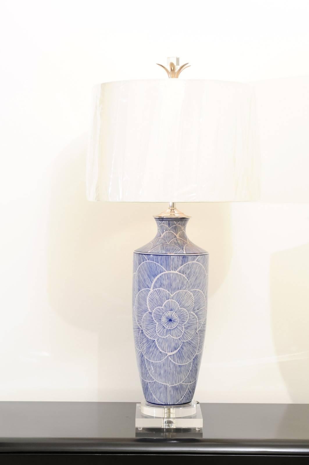 A stellar pair of vintage large-scale ceramic vessels as custom-made lamps. Lovely form with striking graphic motif. These pieces have been painstakingly built using components of only the finest quality. Exquisite jewelry! Excellent Restored