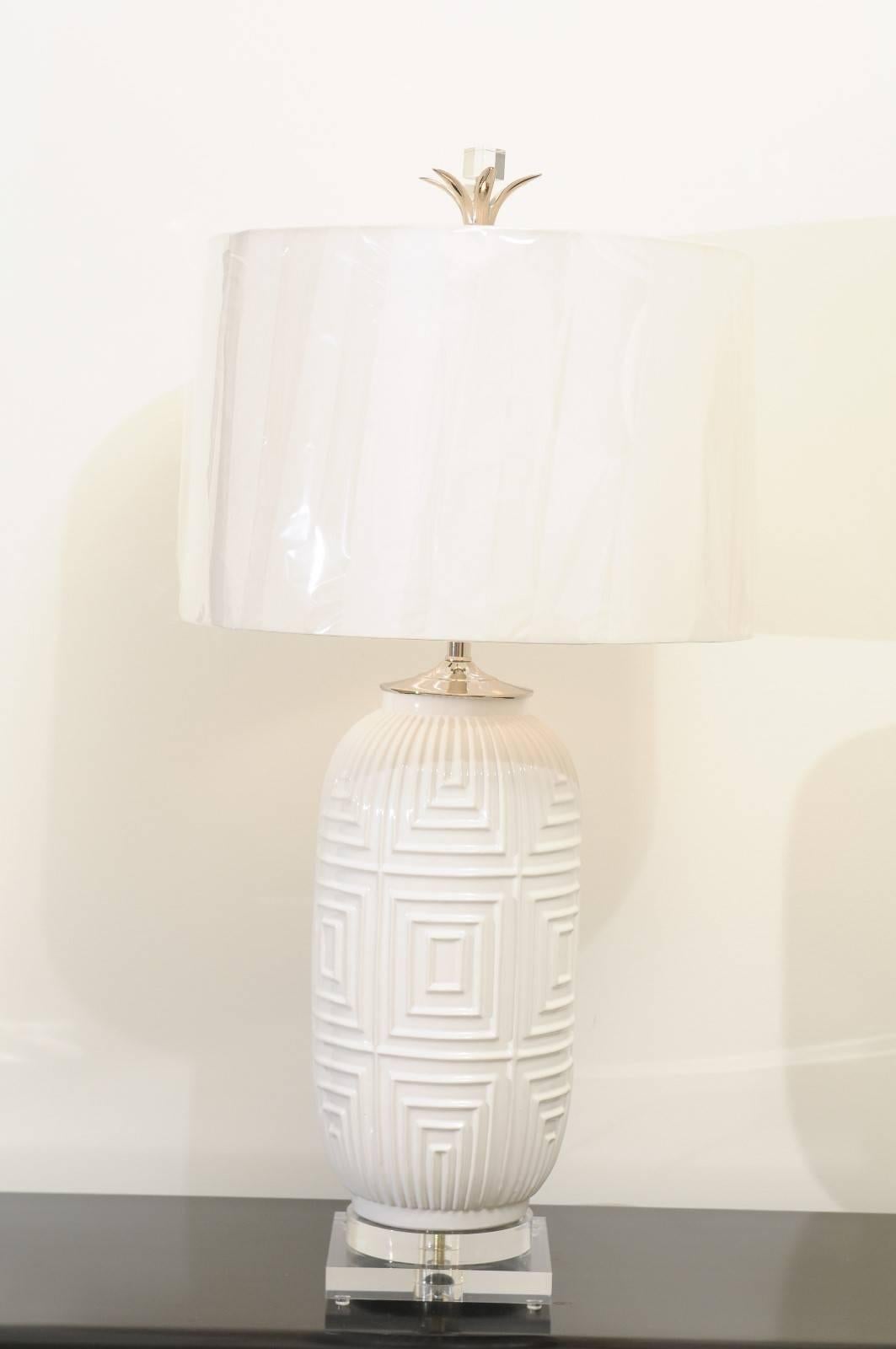 A fabulous pair of large-scale ceramic vessels as custom-made lamps. Beautiful form with graphic texture. These lovely pieces have been built using components of only the finest quality. Exceptional jewelry! Excellent restored condition. Wired using