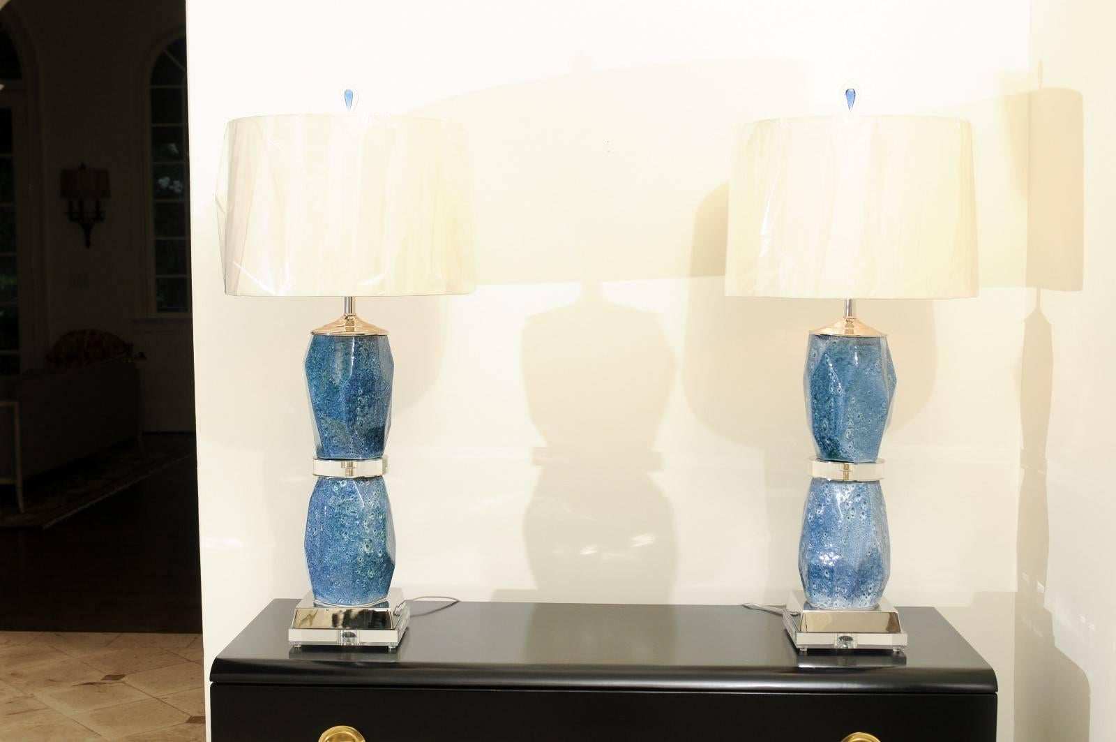 A stunning, chunky and unique pair of custom-made lamps with great scale; fashioned using handmade pieces of Portuguese ceramic pottery. The ceramics are, circa 1980. The lamps are constructed in the Rock crystal style. Exceptional range of color