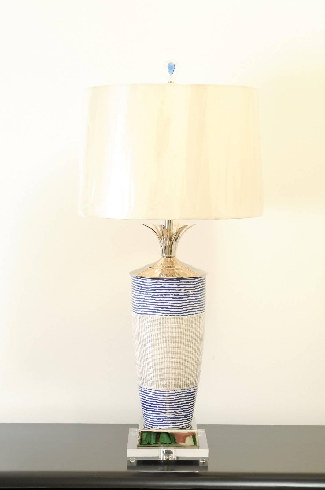 These magnificent lamps are shipped as photographed and described in the narrative. They are custom built using materials of the highest quality and are shipped complete with the new shades, harps and finials shown in the photos.

 A stunning pair