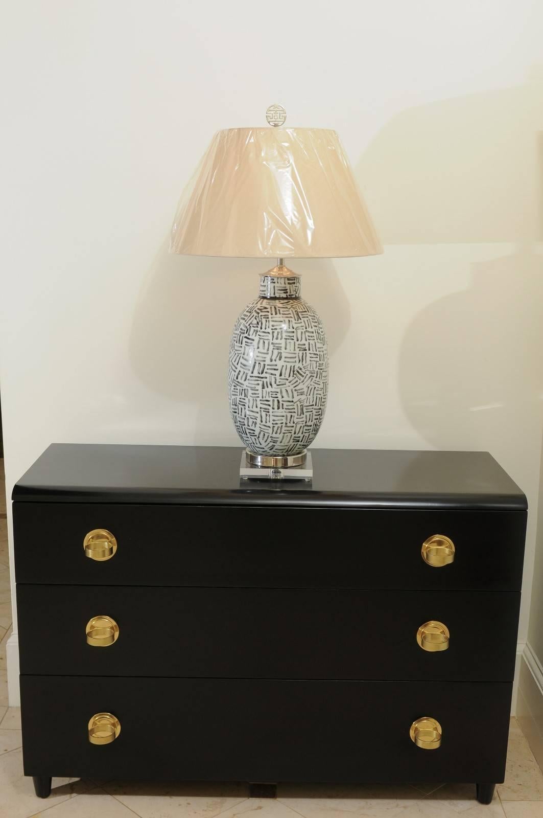 These magnificent lamps are shipped as photographed and described in the narrative. They are custom built using materials of the highest quality and are shipped complete with the new shades, harps and finials shown in the photos.

An outstanding