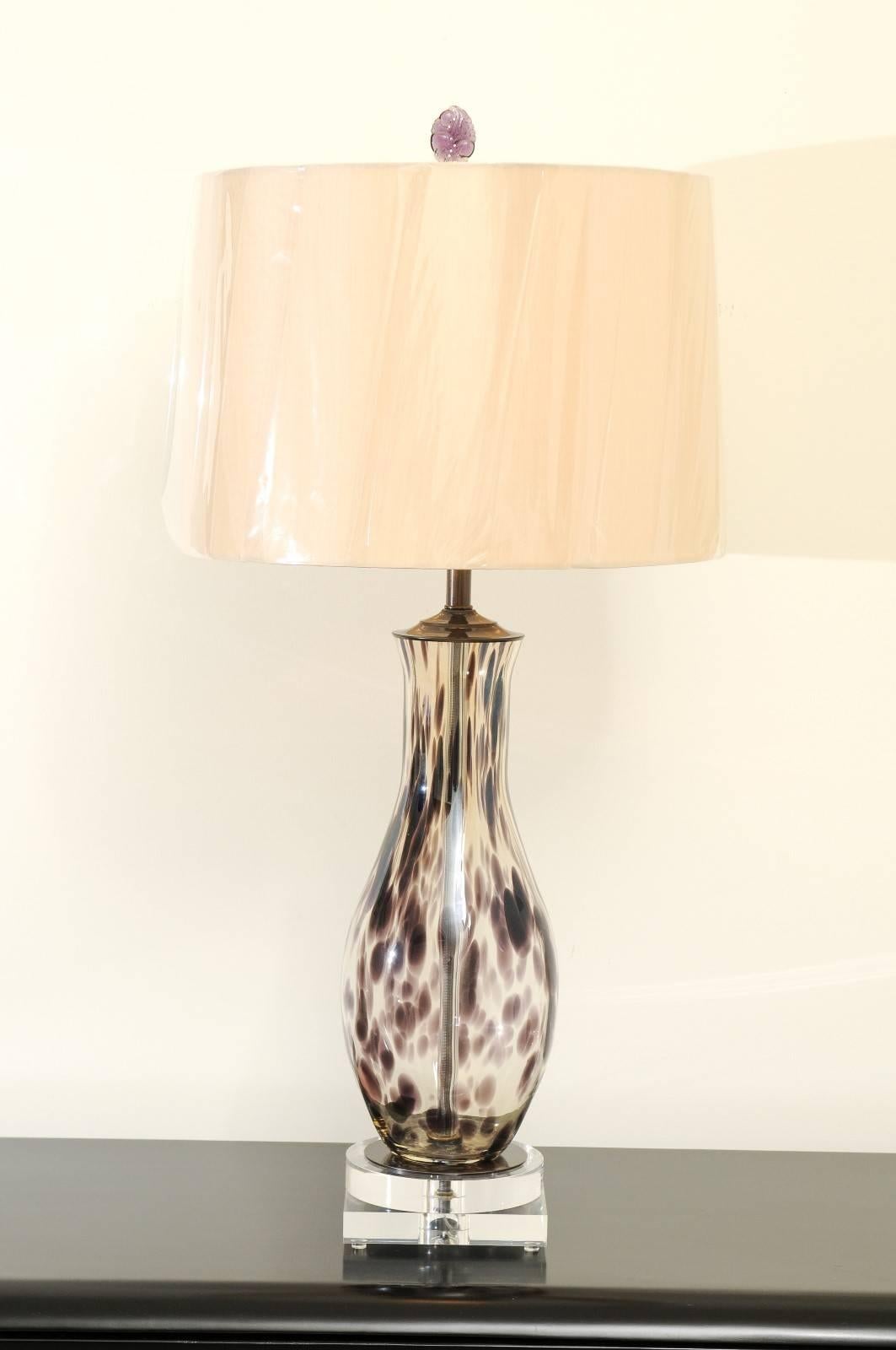 A stellar pair of blown Murano glass vases, circa 1980, as newly made custom lamps. Heavy, beautiful form with stunning charcoal spotting. Custom built using components of only the finest quality. Exceptional jewelry! Excellent restored condition.