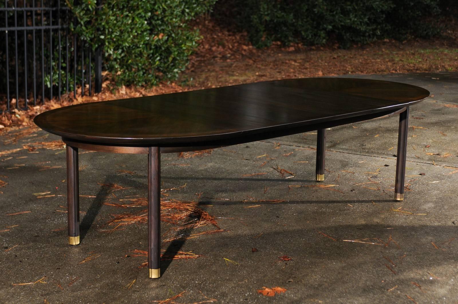 This magnificent dining table is shipped as professionally photographed and described in the listing narrative: Meticulously professionally restored and completely installation ready

A stunning example of an incredibly rare extension dining table