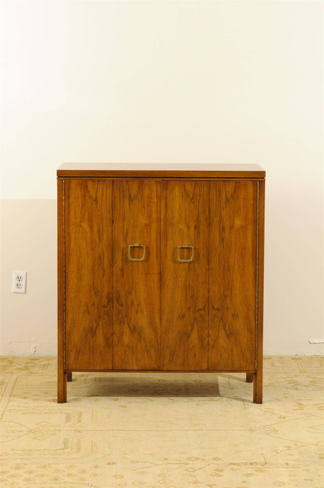 This magnificent chest is shipped as professionally photographed and described in the listing narrative: Meticulously professionally restored and completely installation ready.

A beautiful modern multipurpose cabinet by John Widdicomb, circa 1960.