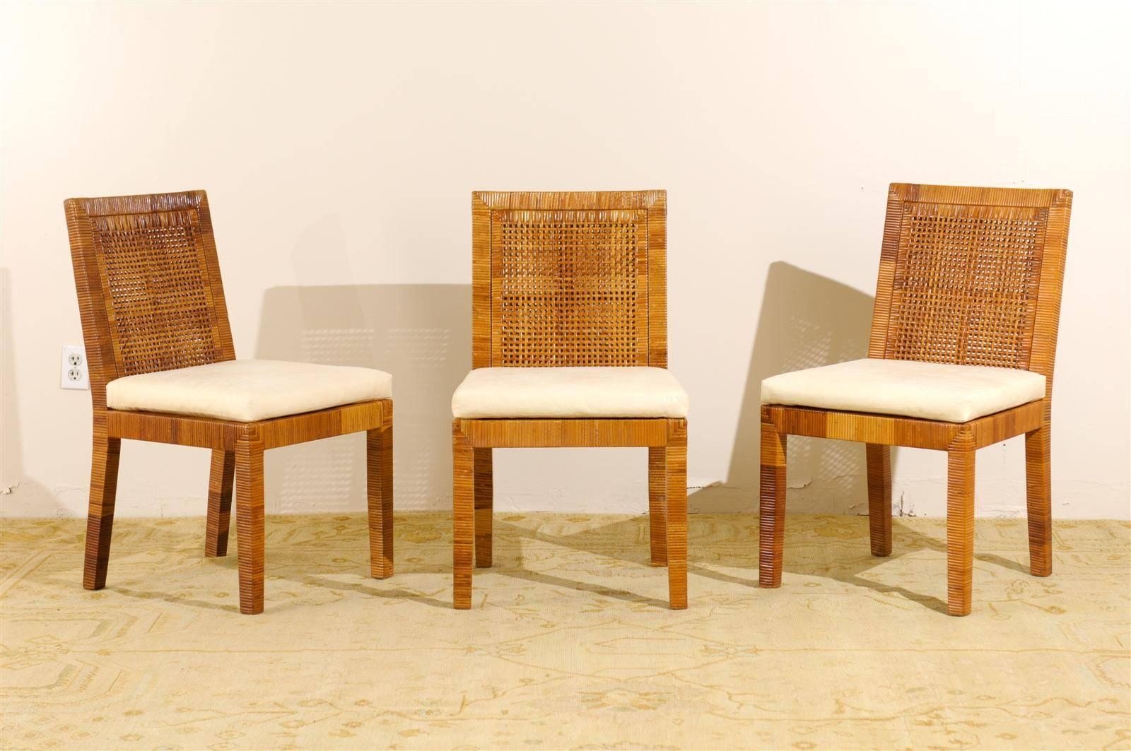 A fabulous set of six ( 6 ) cane back Parsons style dining chairs, circa 1970.  Stout hardwood frame wrapped in rattan.  Veneer displays stunning color range, patina and depth.  Fine, beautifully made pieces.  Excellent Restored Condition.  The