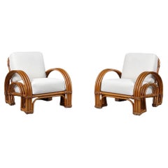 Unforgettable Pair of Art Deco Rattan and Cane Double Horseshoe Loungers