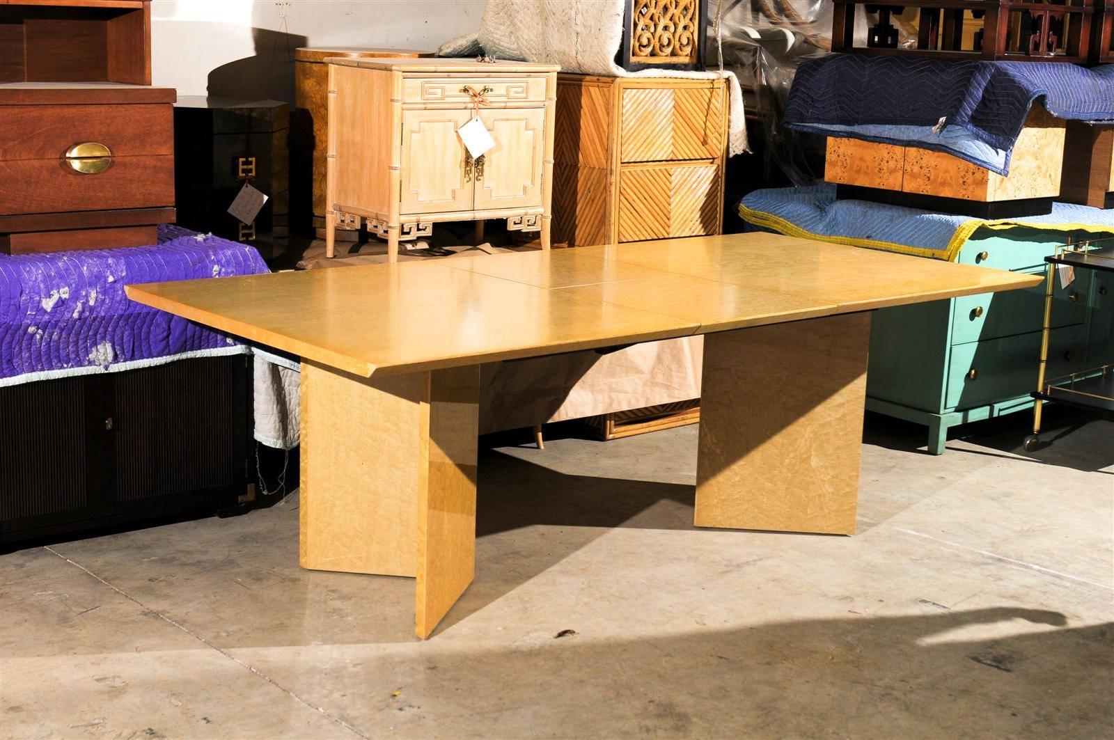 This magnificent dining table is shipped as professionally photographed and described in the listing narrative: Meticulously professionally restored and installation ready.

A fabulous Modern knife edge extension dining or conference table, circa