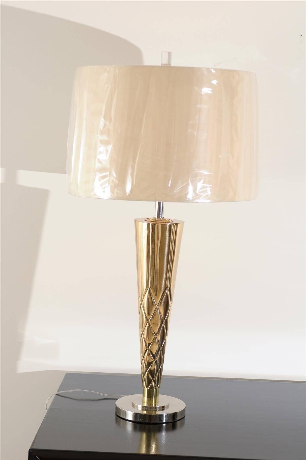 A stunning pair of large-scale vintage Tornado style lamps, circa 1960. Solid bronze sculpture finished in brass, on a nickel base and nickel accents. Heavy, exceptionally made pieces. Sophisticated jewelry! Excellent restored condition. The